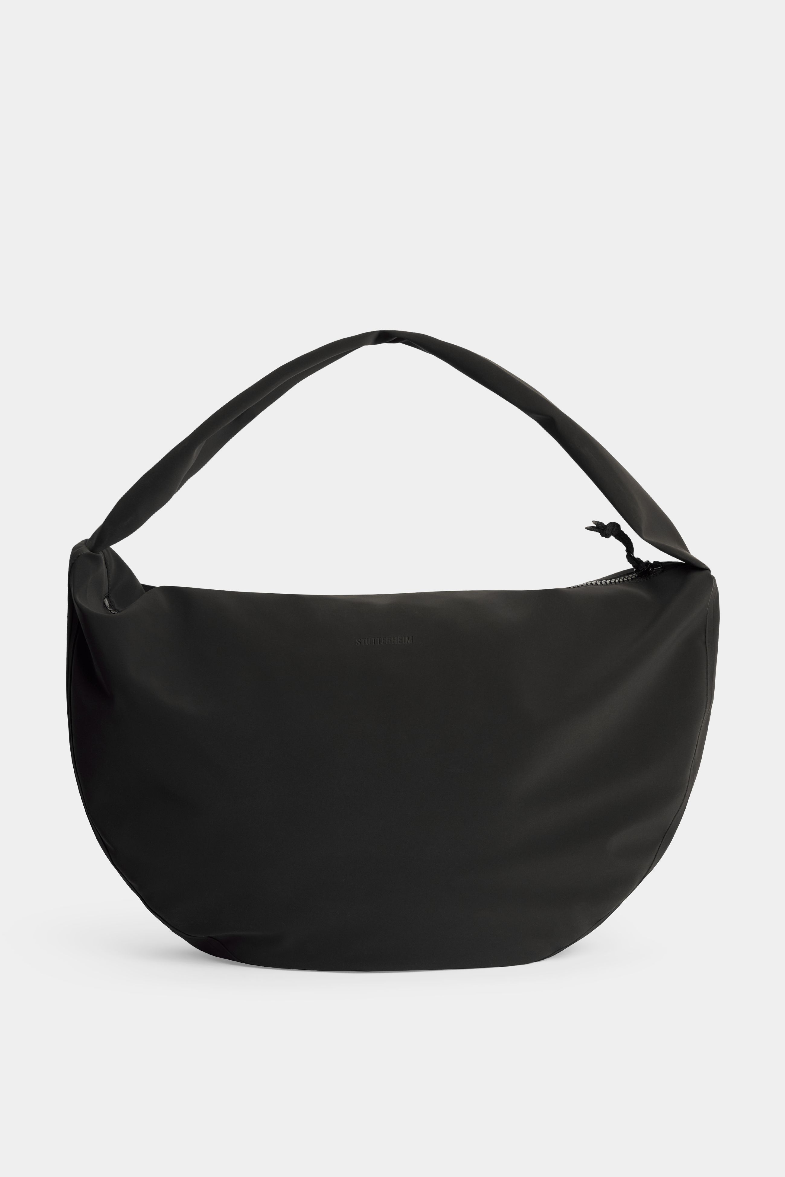 stutterheim adam bag matte black accessories bags crossbody-bags