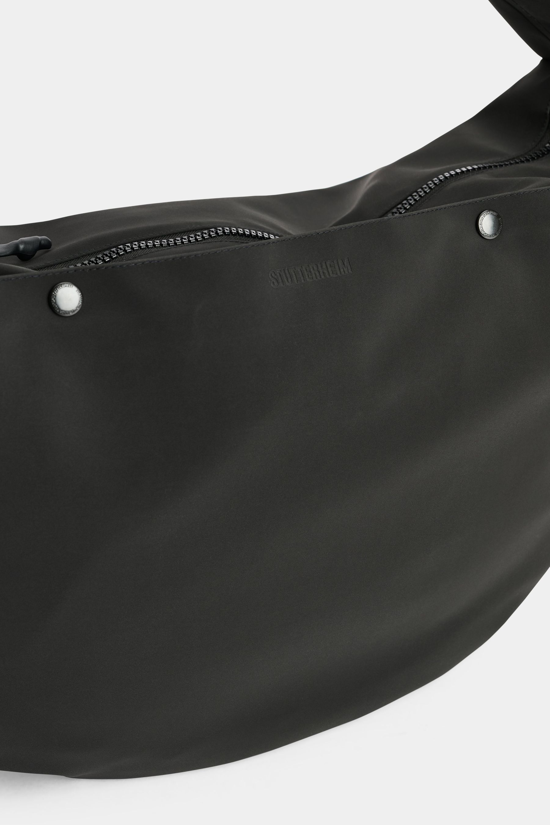 stutterheim adam bag matte black accessories bags crossbody-bags