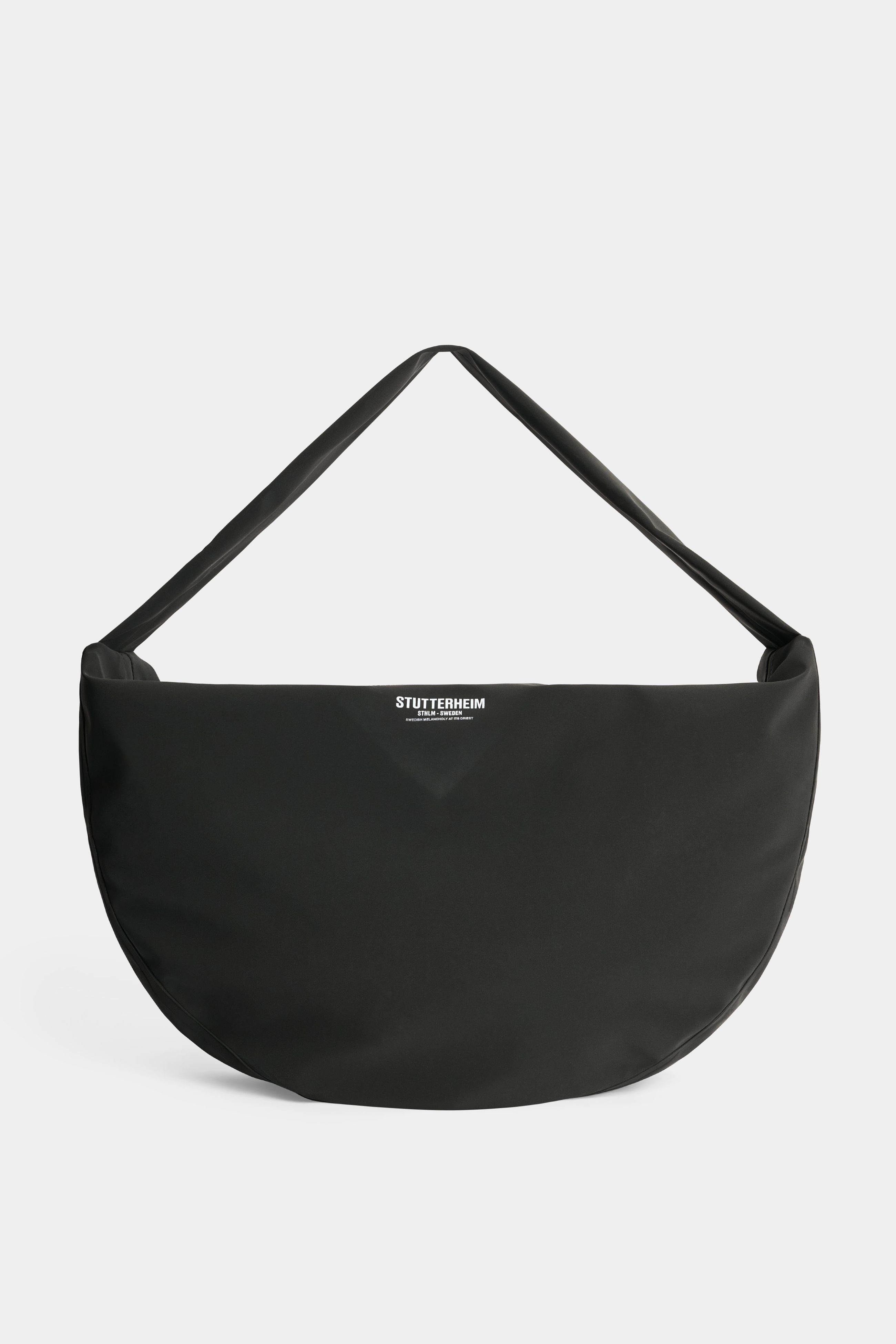 stutterheim adam bag matte black accessories bags crossbody-bags