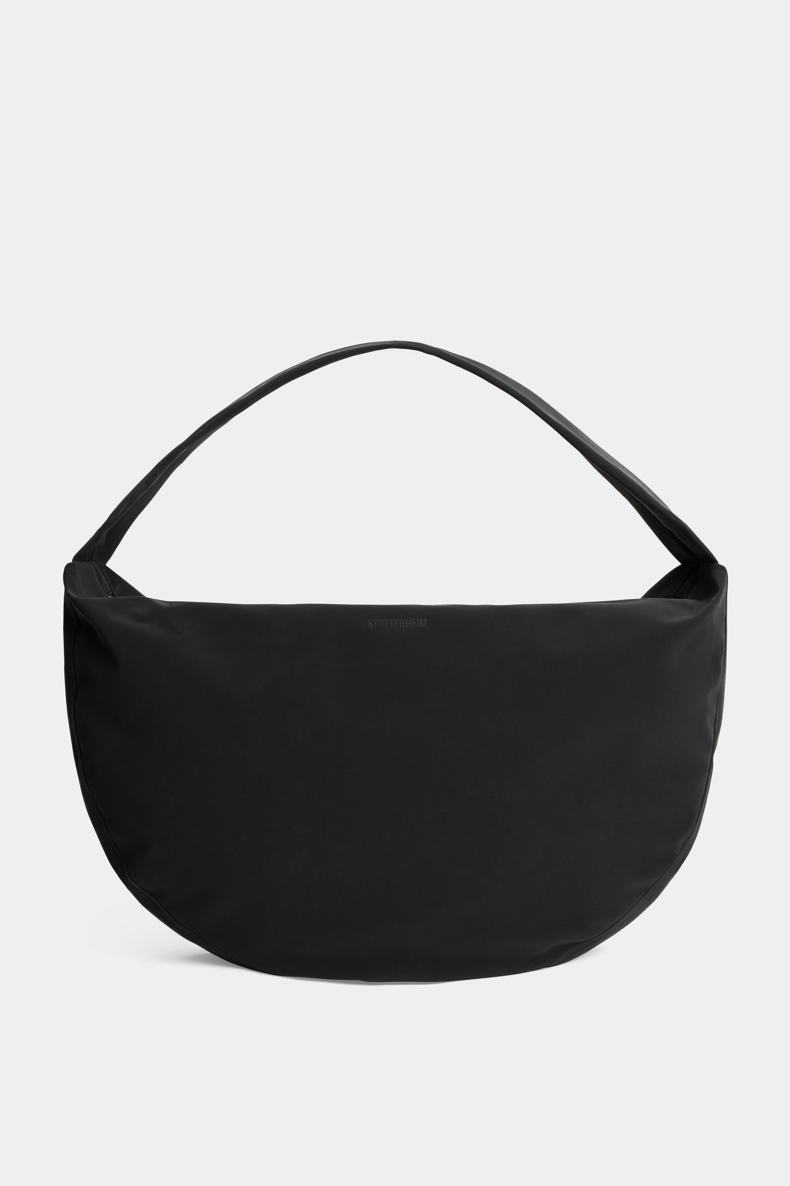 stutterheim adam bag matte black accessories bags crossbody-bags