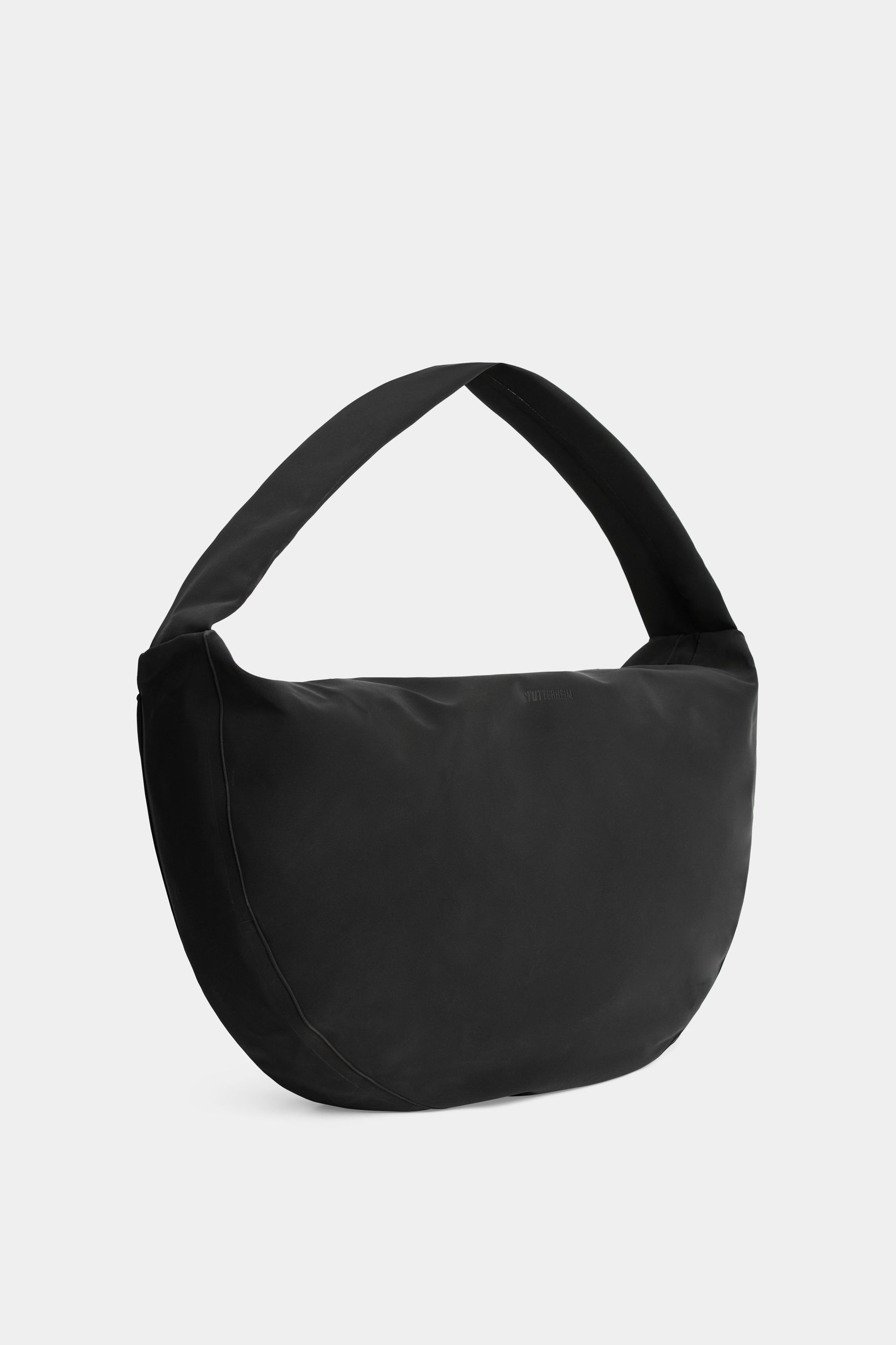 stutterheim adam bag matte black accessories bags crossbody-bags