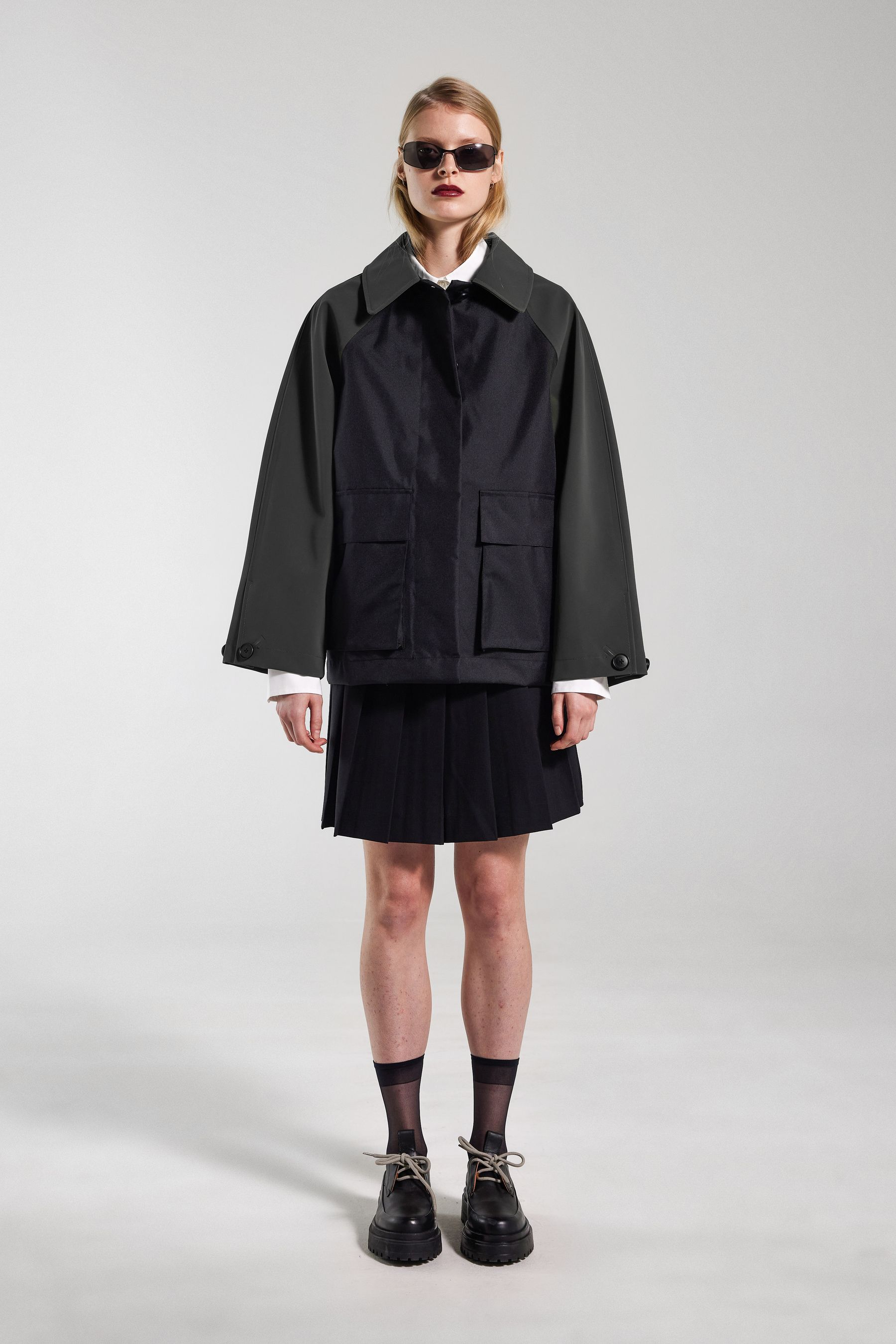 stutterheim bandhagen patch raincoat black women jackets raincoats