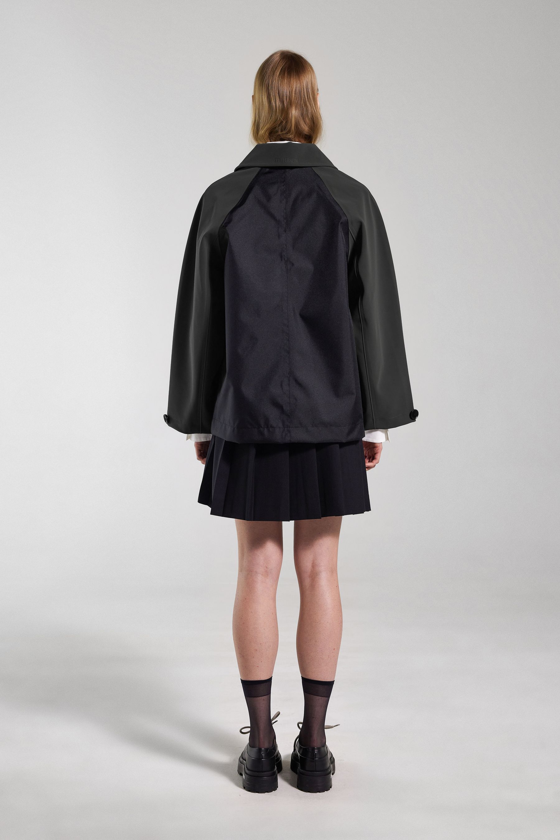 stutterheim bandhagen patch raincoat black women jackets raincoats