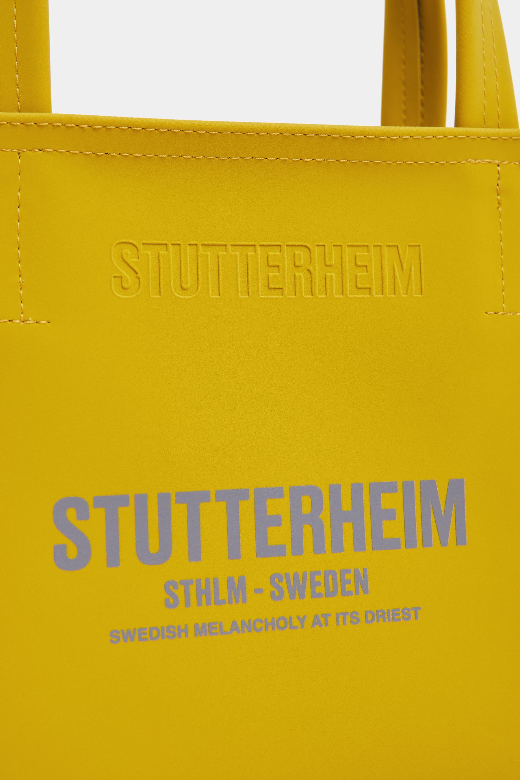 stutterheim biblio matte bag gold accessories bags handbags