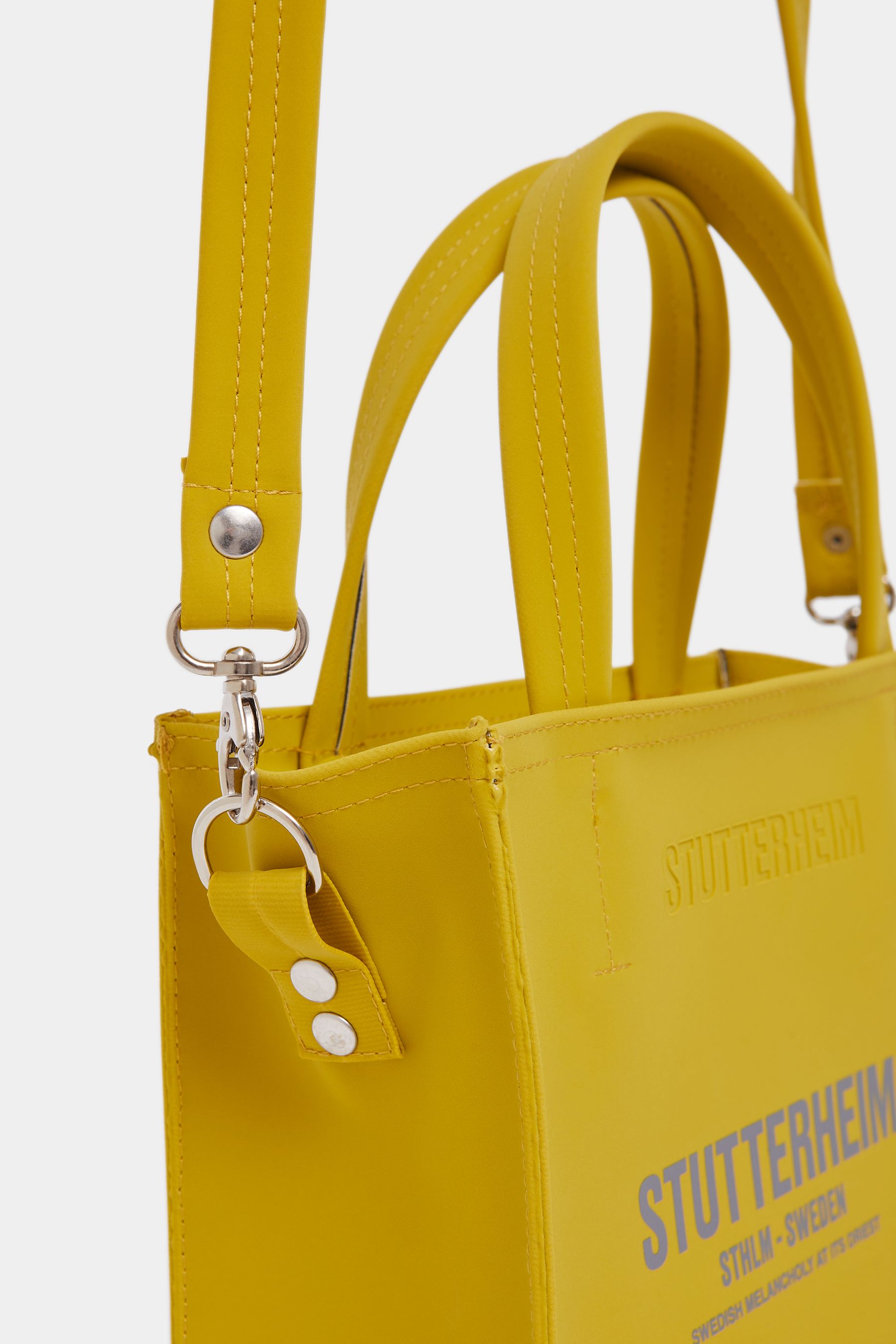 stutterheim biblio matte bag gold accessories bags handbags