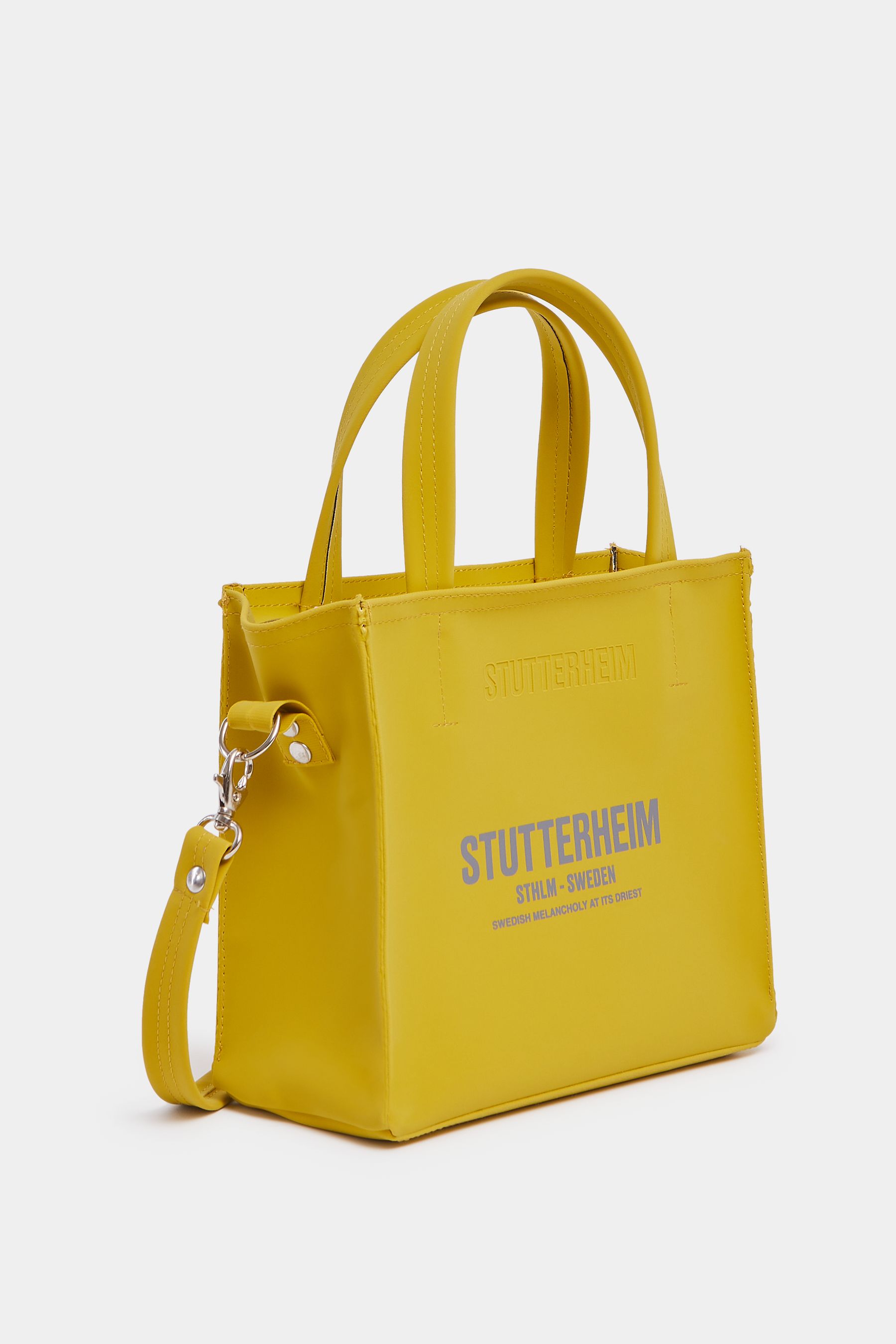 stutterheim biblio matte bag gold accessories bags handbags