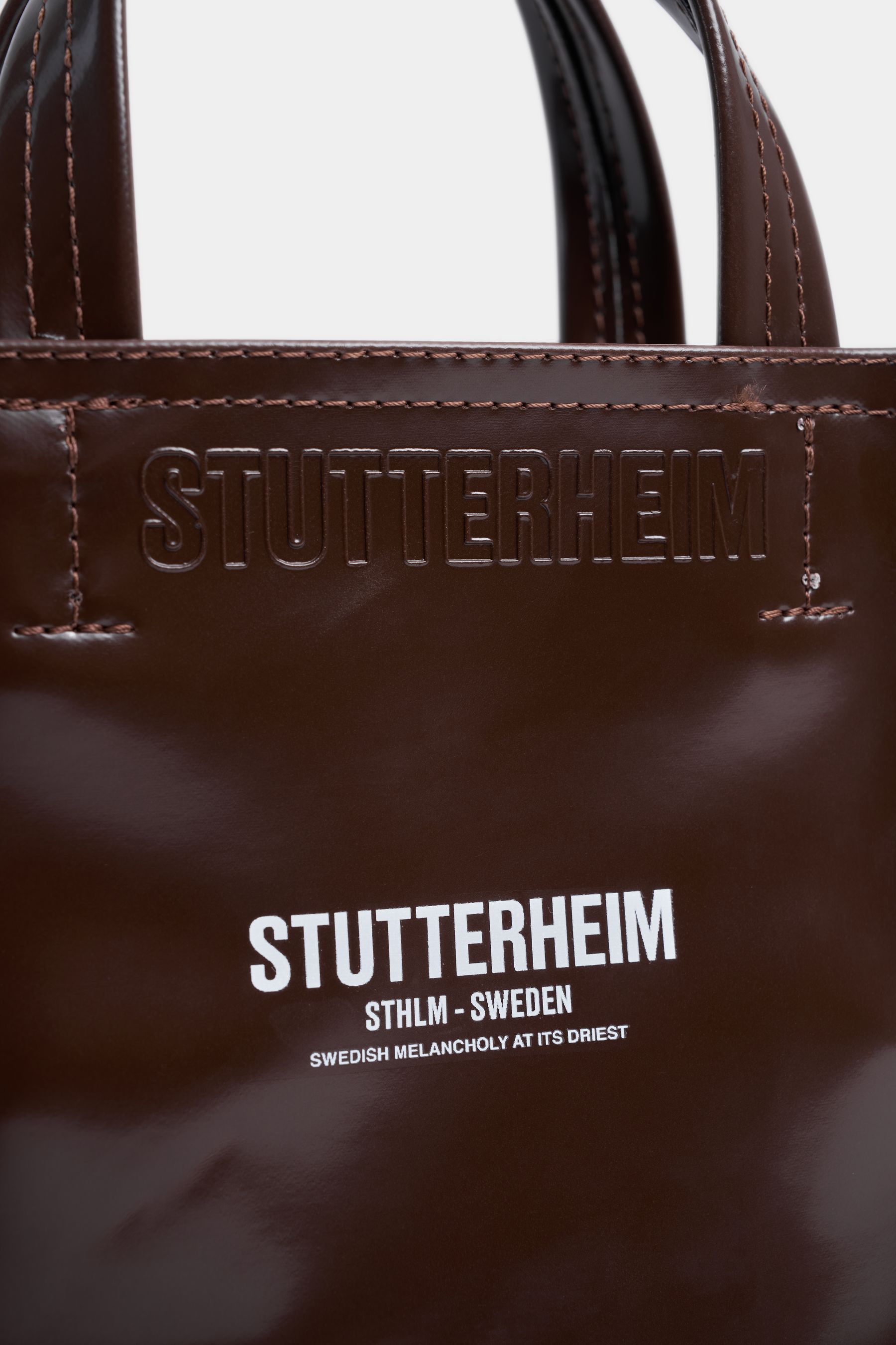 stutterheim biblio opal mini bag dark brown  accessories bags handbags