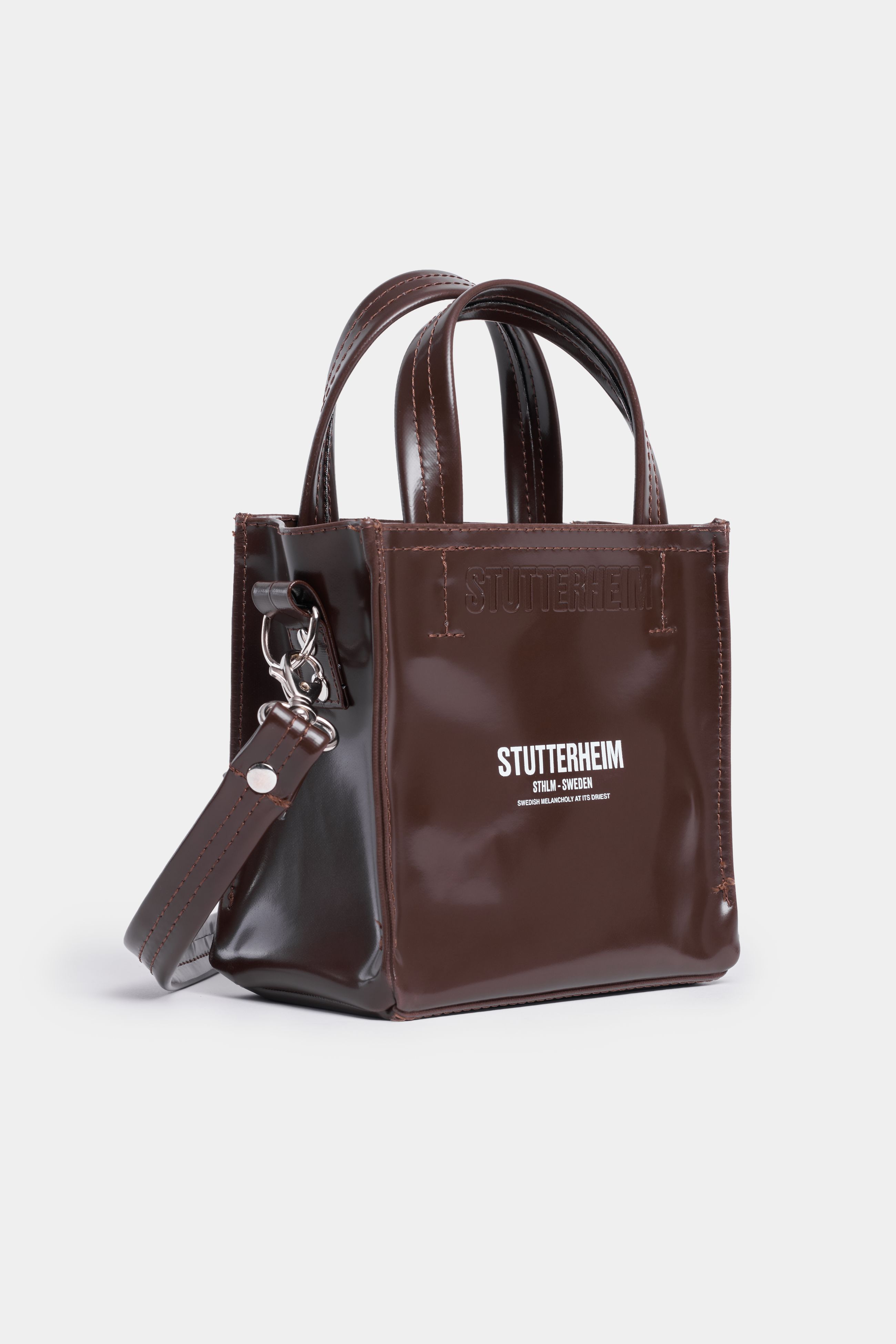 stutterheim biblio opal mini bag dark brown  accessories bags handbags