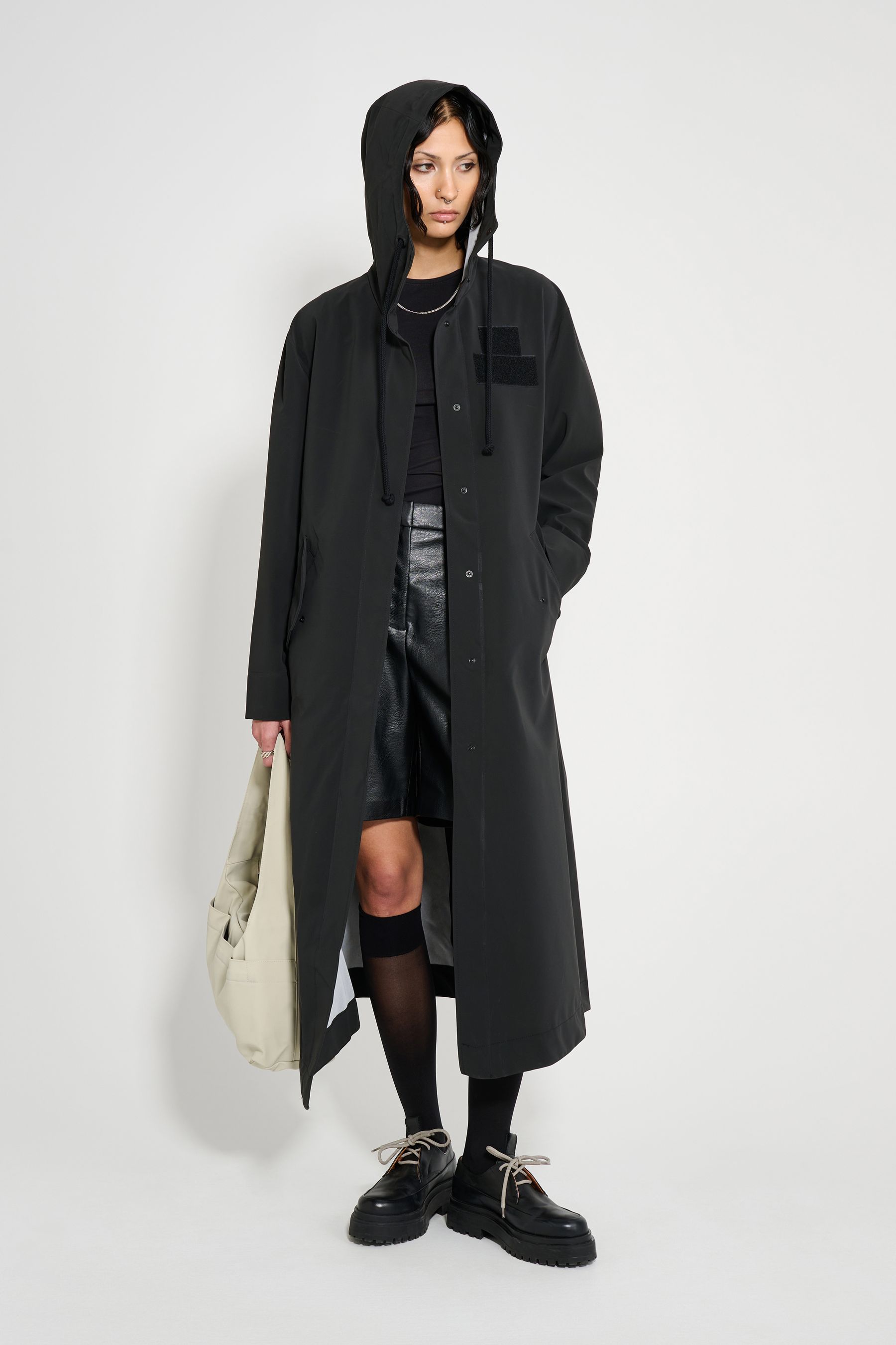 stutterheim chatham matte raincoat black women jackets long-raincoats