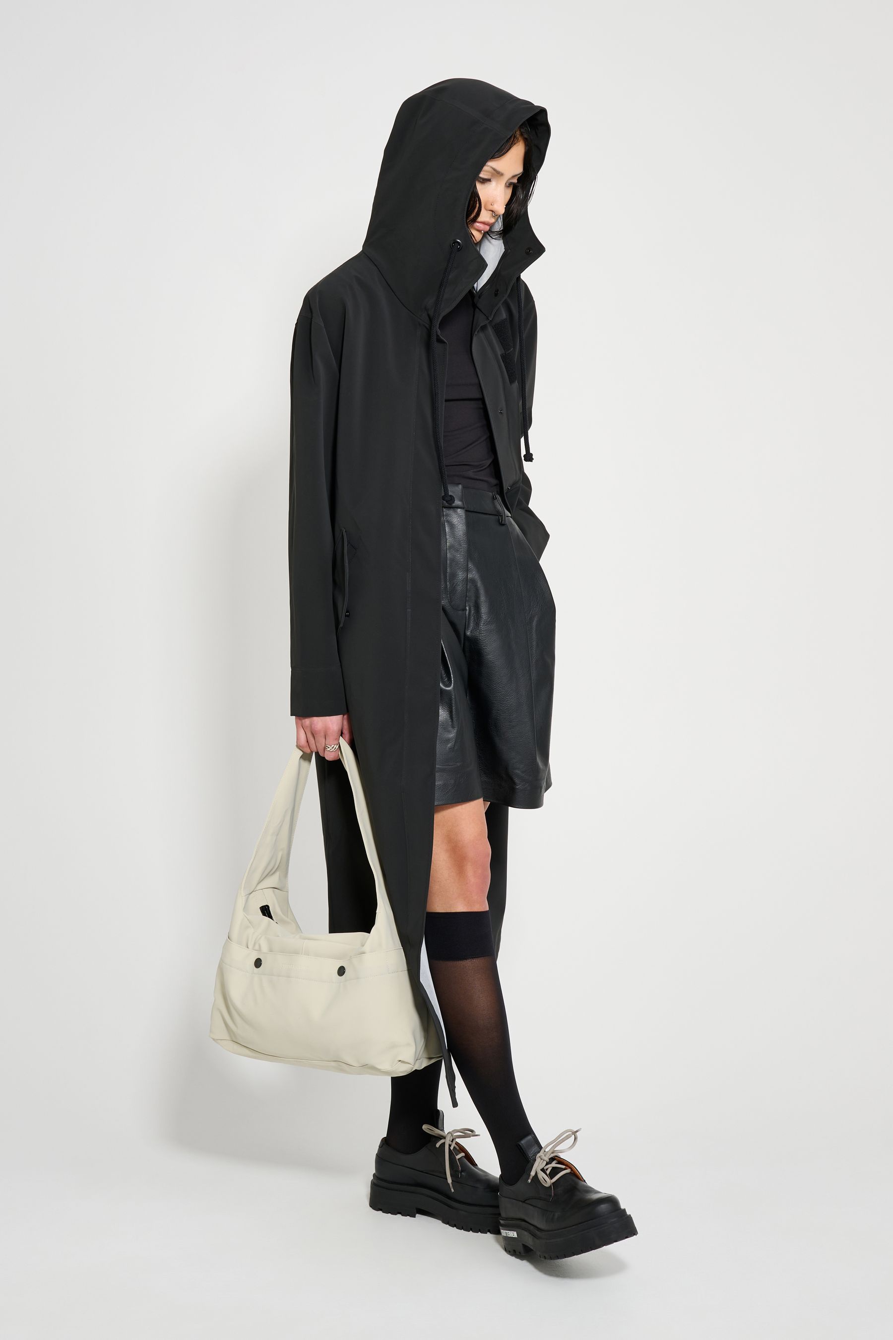 stutterheim chatham matte raincoat black women jackets long-raincoats