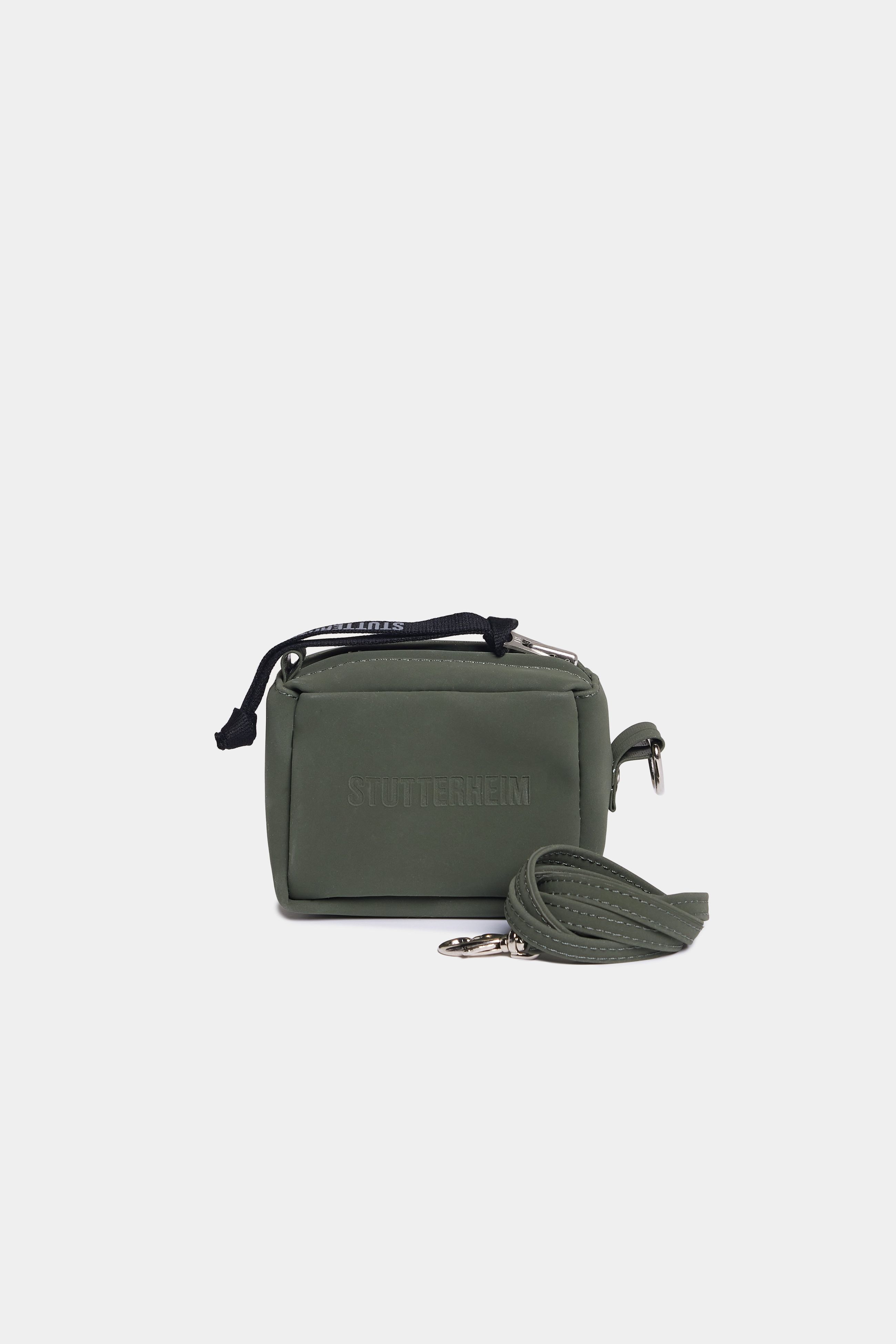 stutterheim micro pack bag green accessories bags handbags