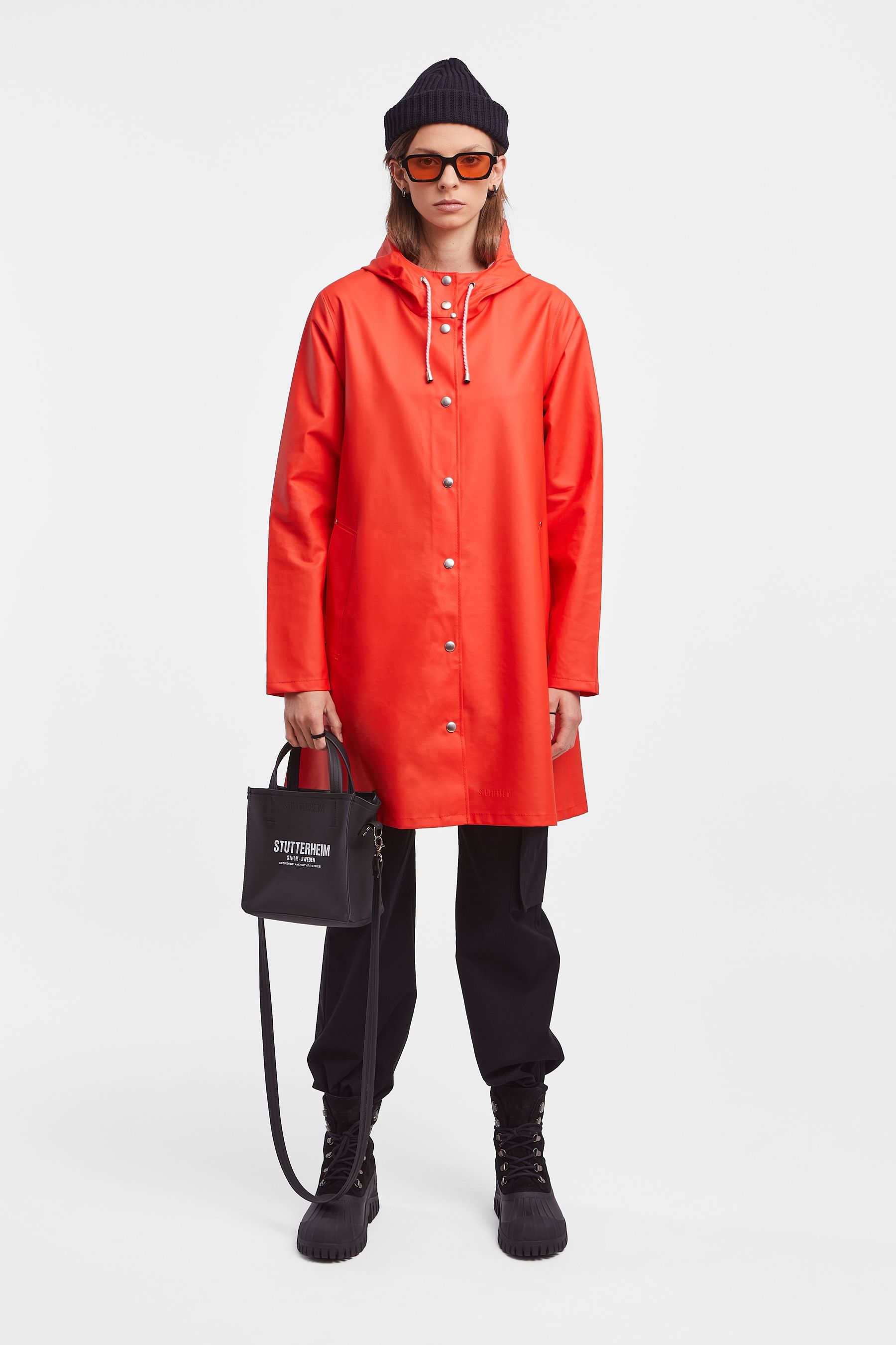 stutterheim mosebacke lightweight raincoat fade red women jackets raincoats