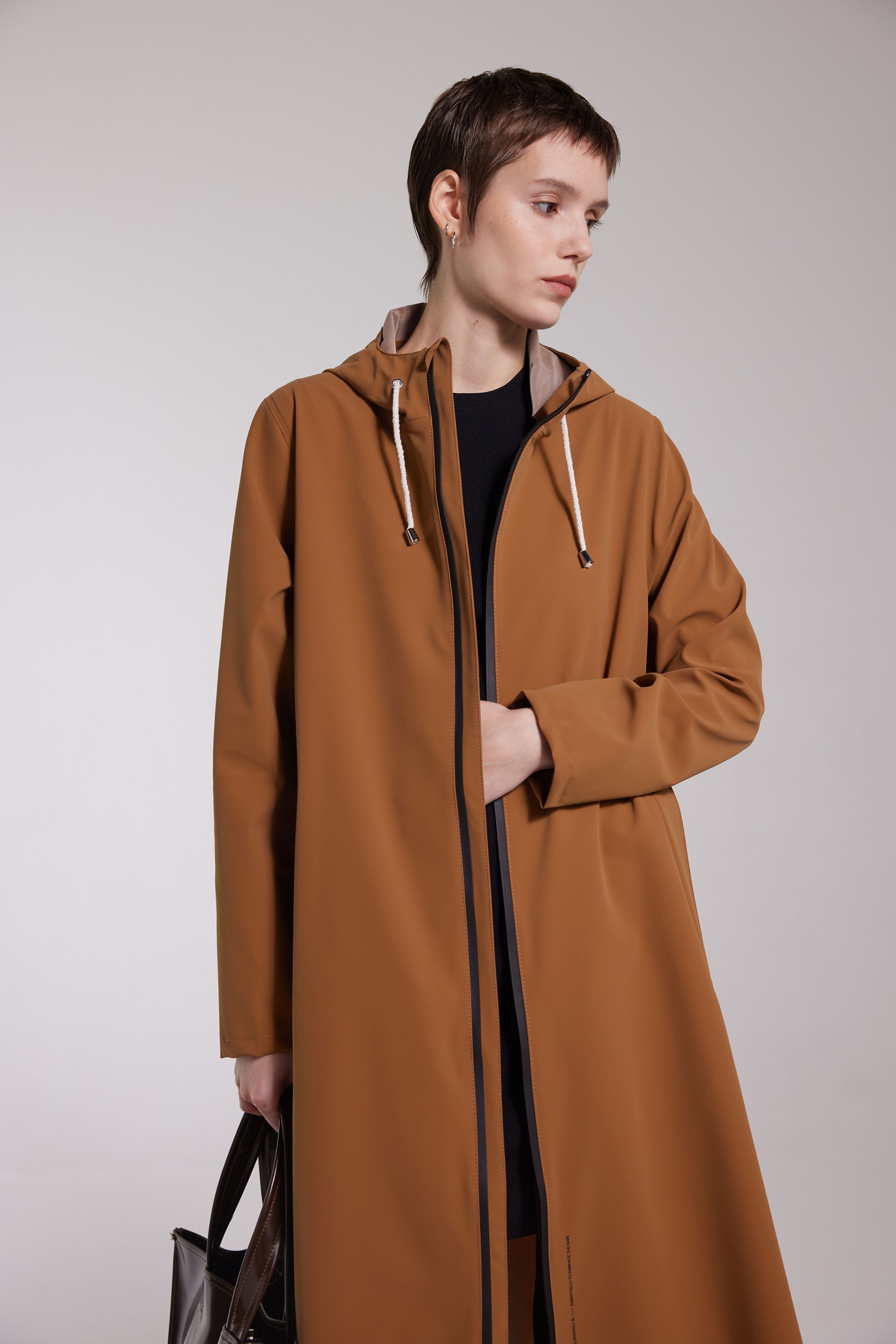 stutterheim mosebacke long lightweight matte zip raincoat cognac women jackets raincoats