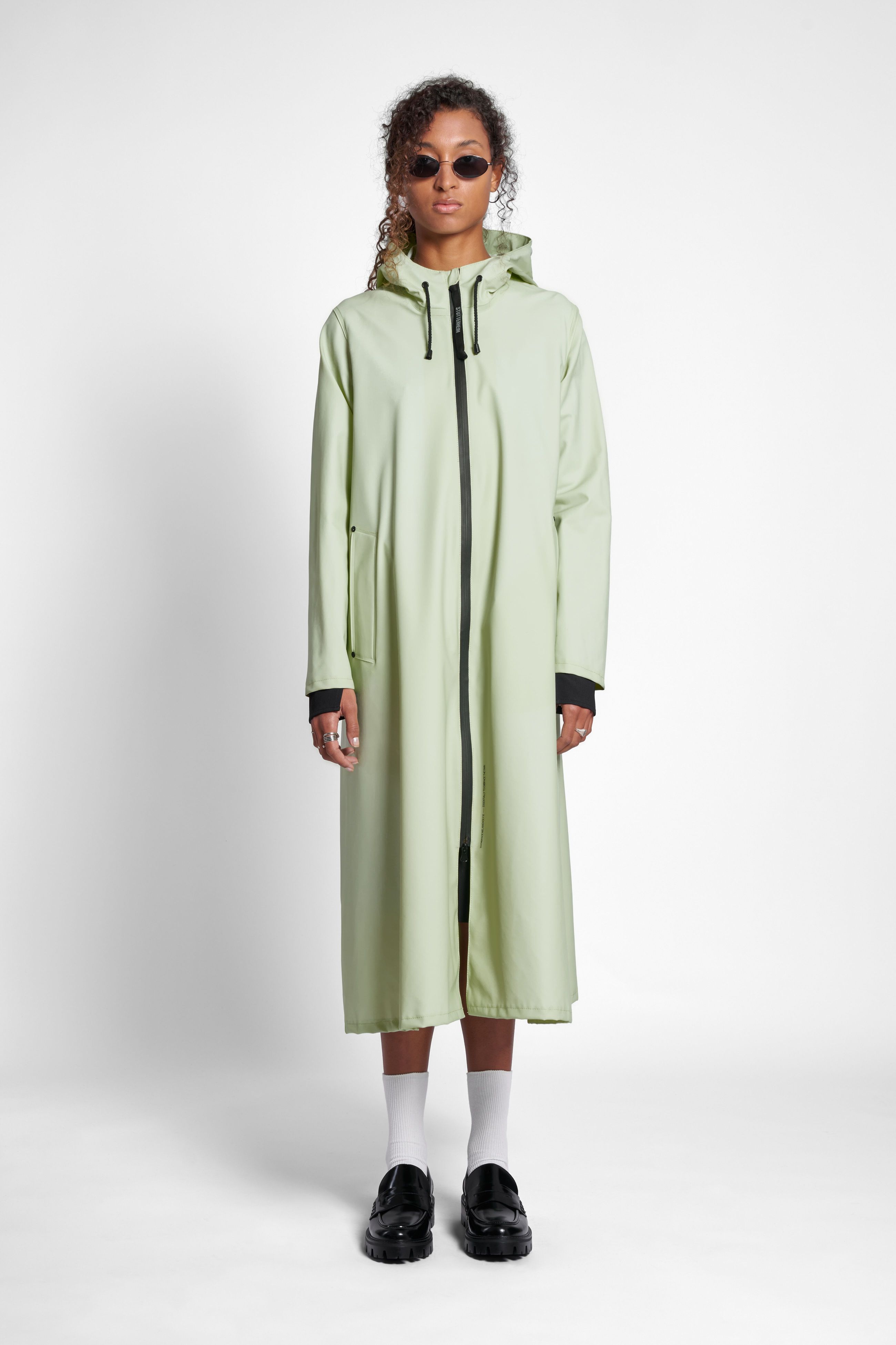 stutterheim mosebacke long zip raincoat seafoam green women jackets long-raincoats