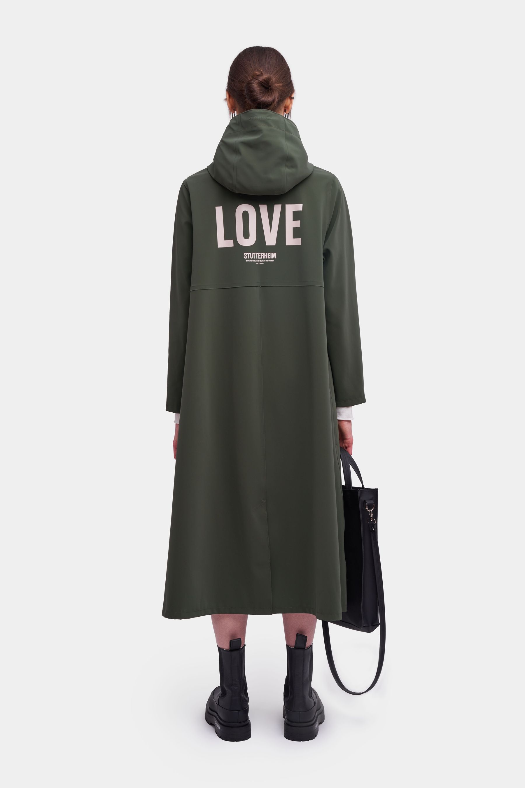 stutterheim mosebacke long matte print raincoat dark green women jackets raincoats