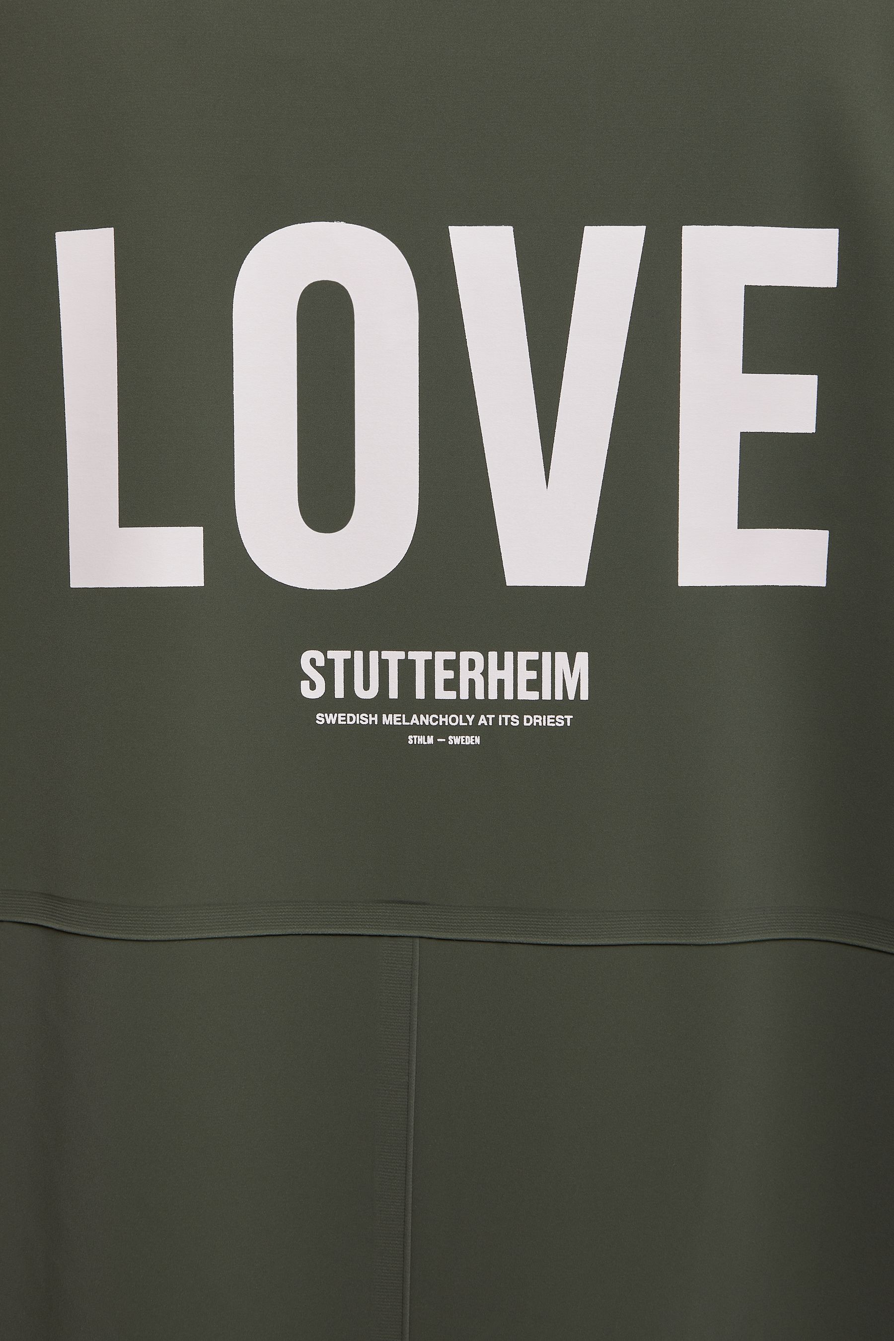 stutterheim mosebacke long matte print raincoat dark green women jackets raincoats