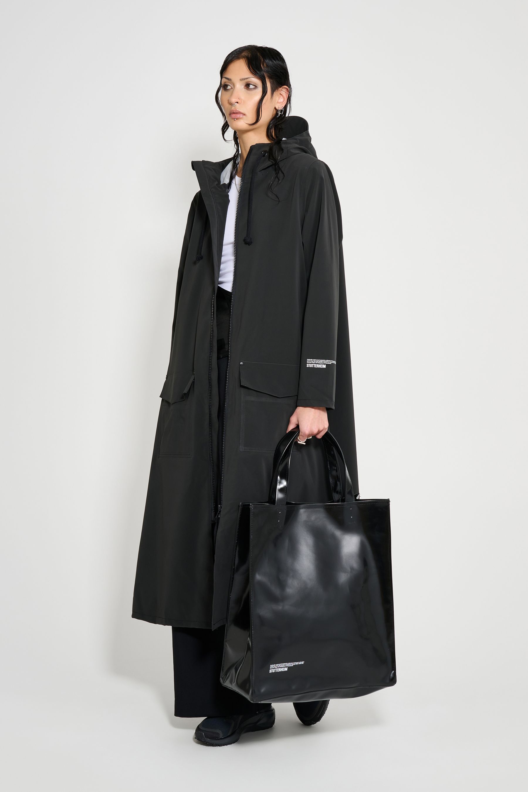 stutterheim mosebacke long patch black women jackets long-raincoats