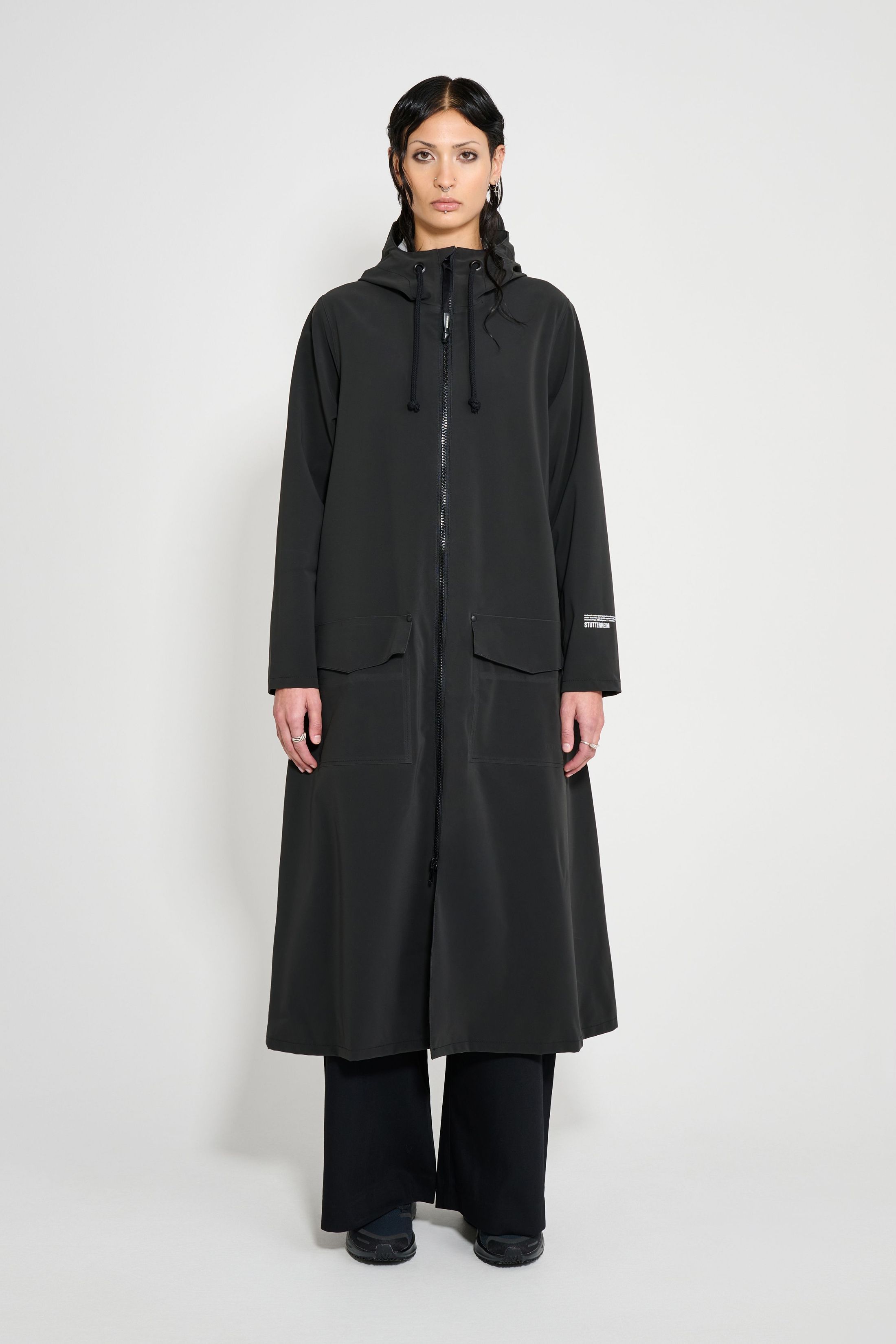 stutterheim mosebacke long patch black women jackets long-raincoats