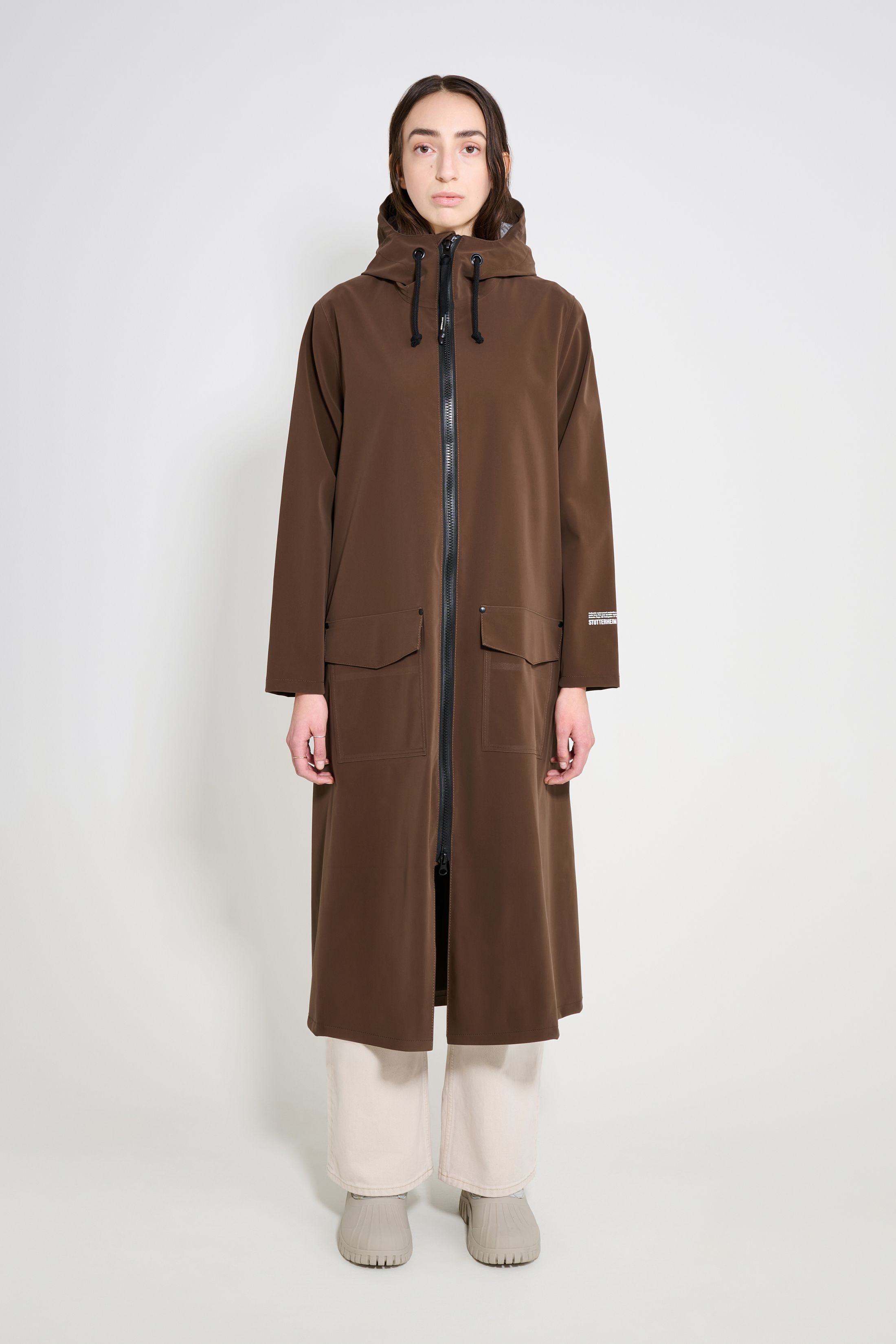 stutterheim mosebacke long patch raincoat dark brown women jackets long-raincoats