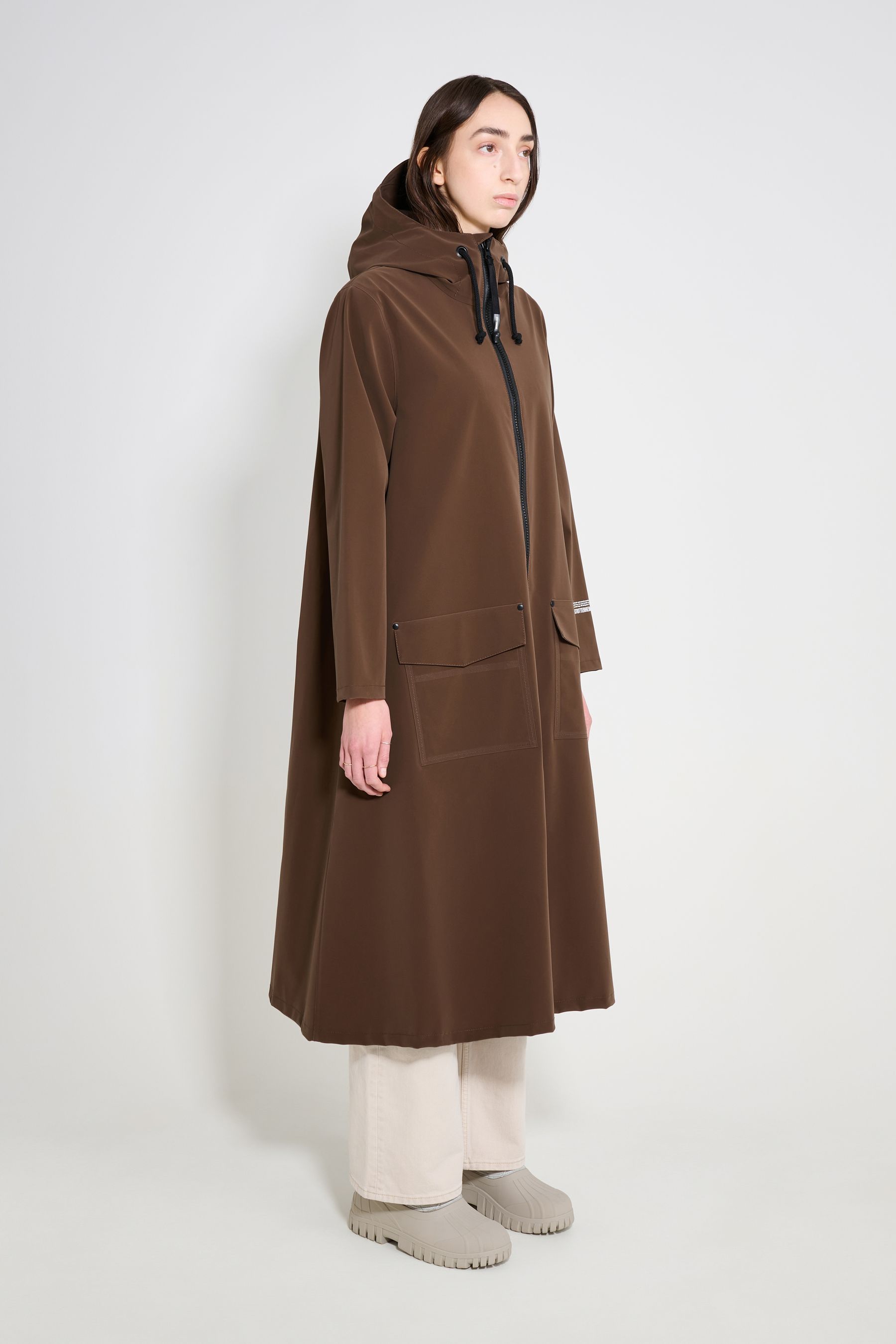 stutterheim mosebacke long patch raincoat dark brown women jackets long-raincoats