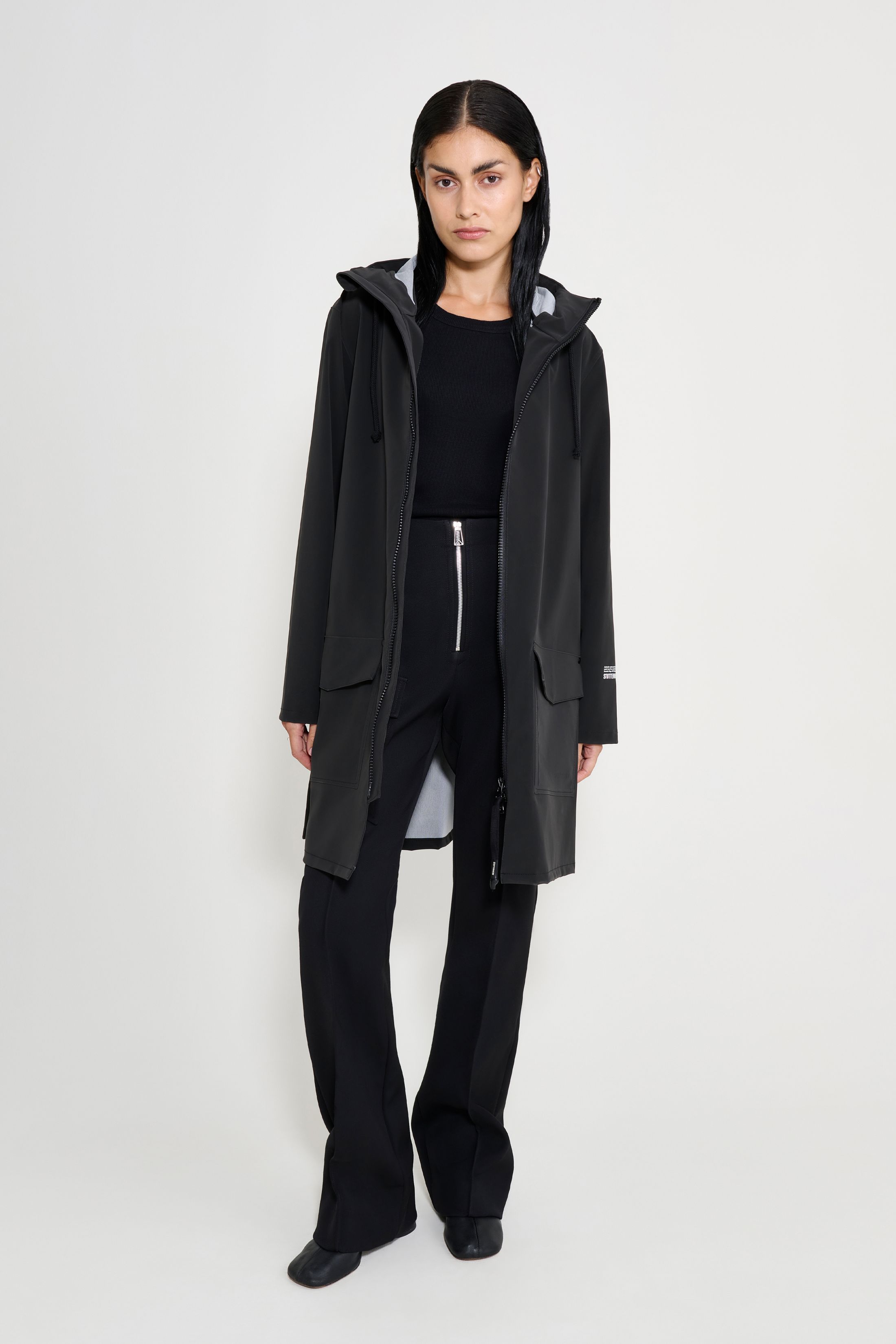 stutterheim mosebacke patch raincoat black women jackets raincoats