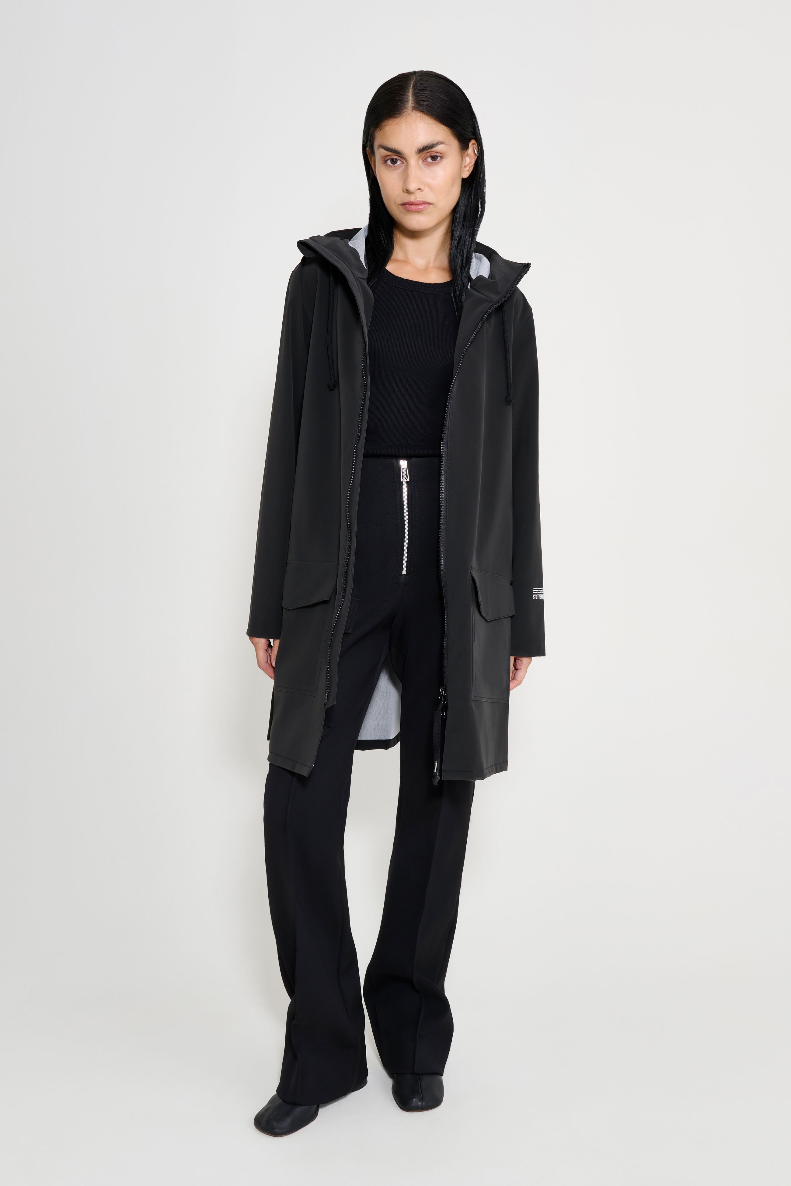 stutterheim mosebacke patch raincoat black women jackets raincoats