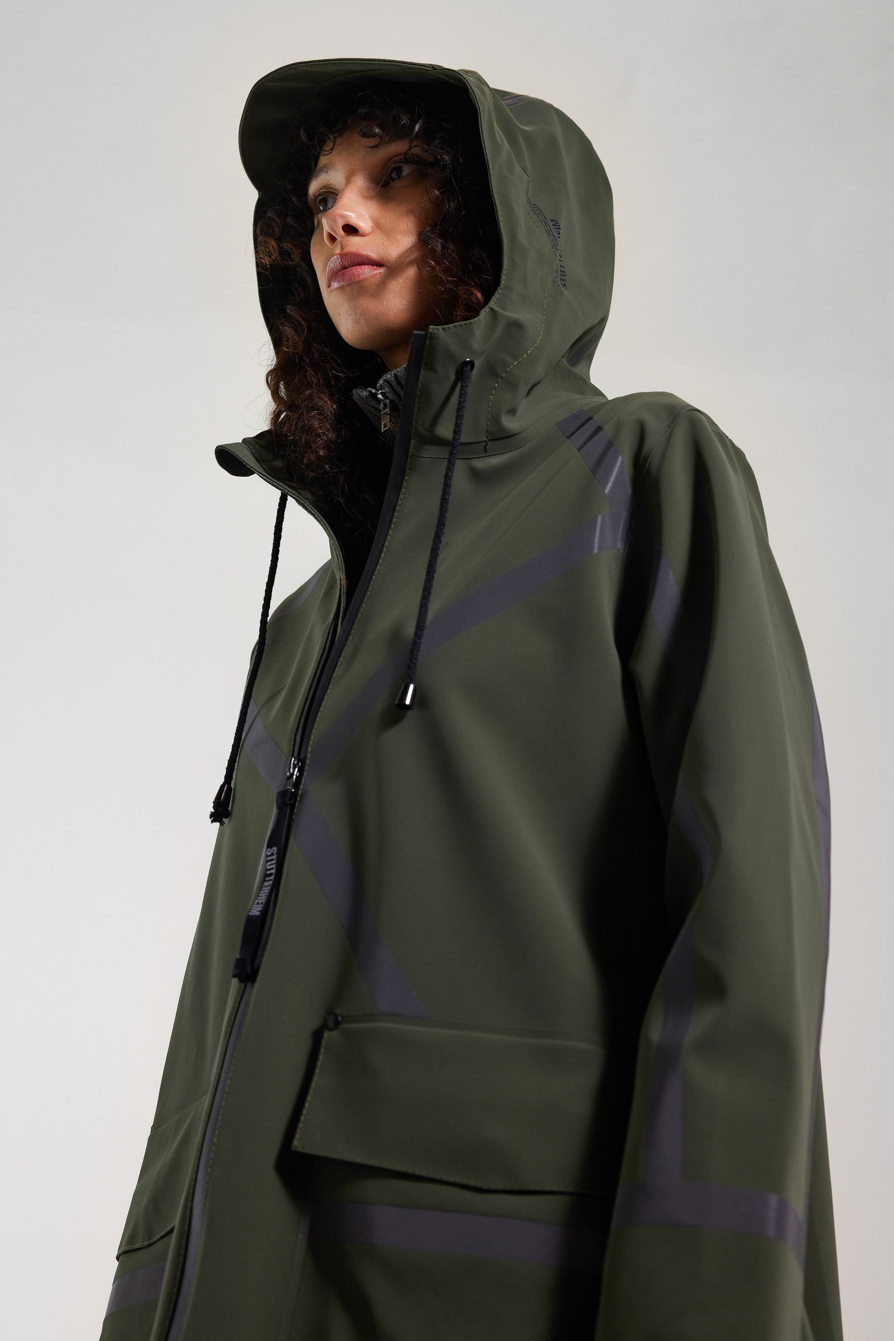 stutterheim mosebacke tape matte raincoat green women jackets raincoats