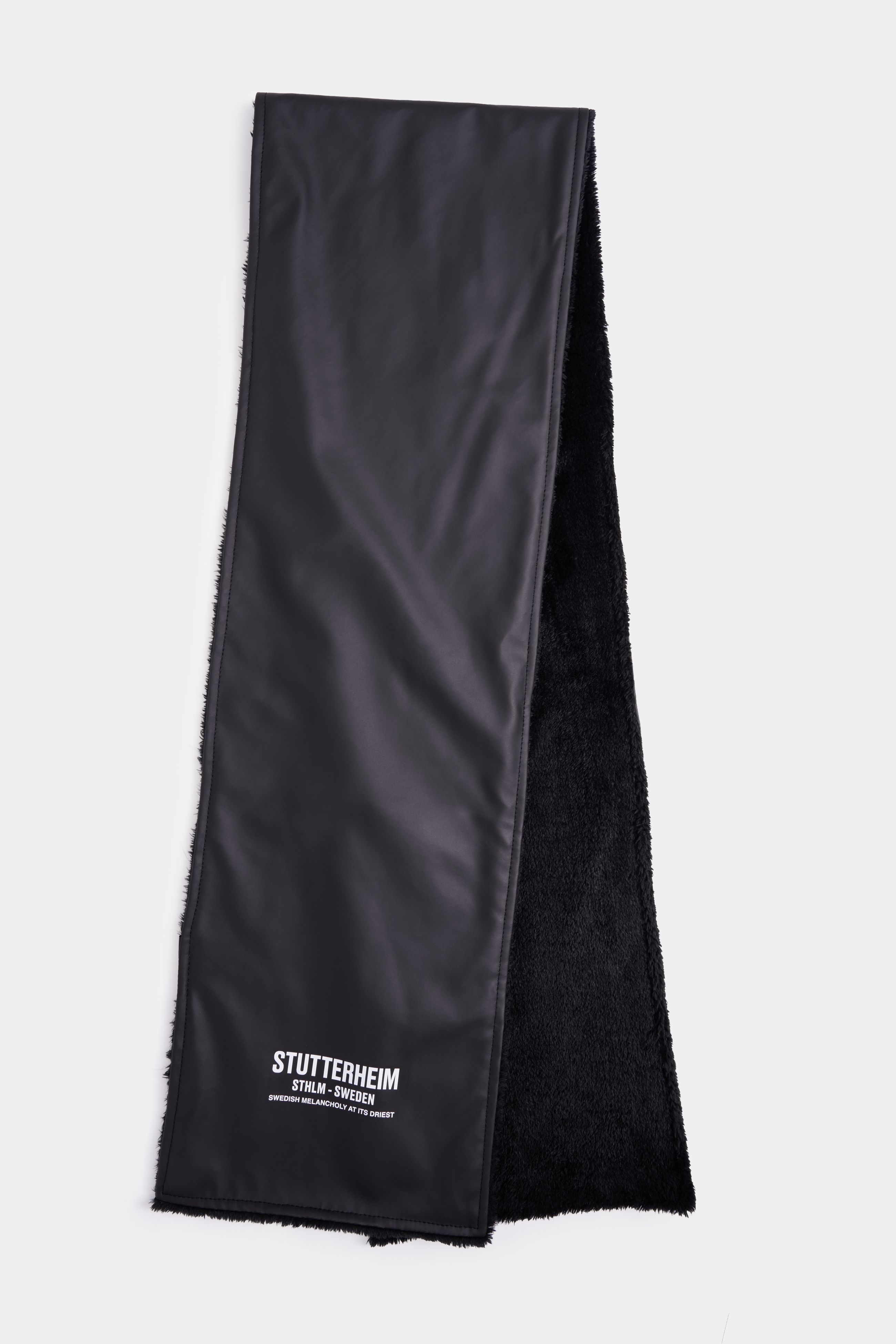 stutterheim rain scarf black accessories hats-and-scarves scarves