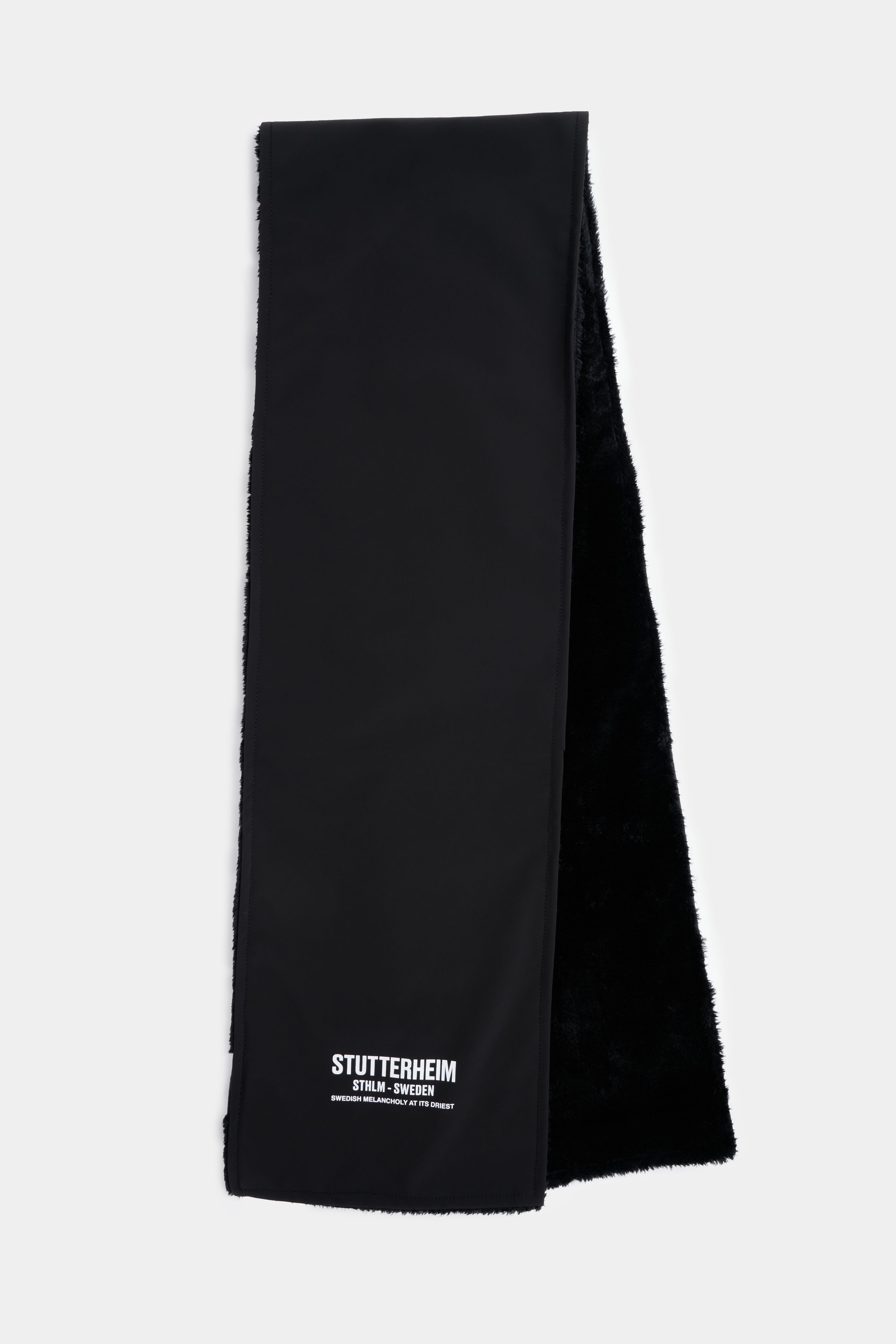 stutterheim rain scarf matte black accessories hats-and-scarves scarves