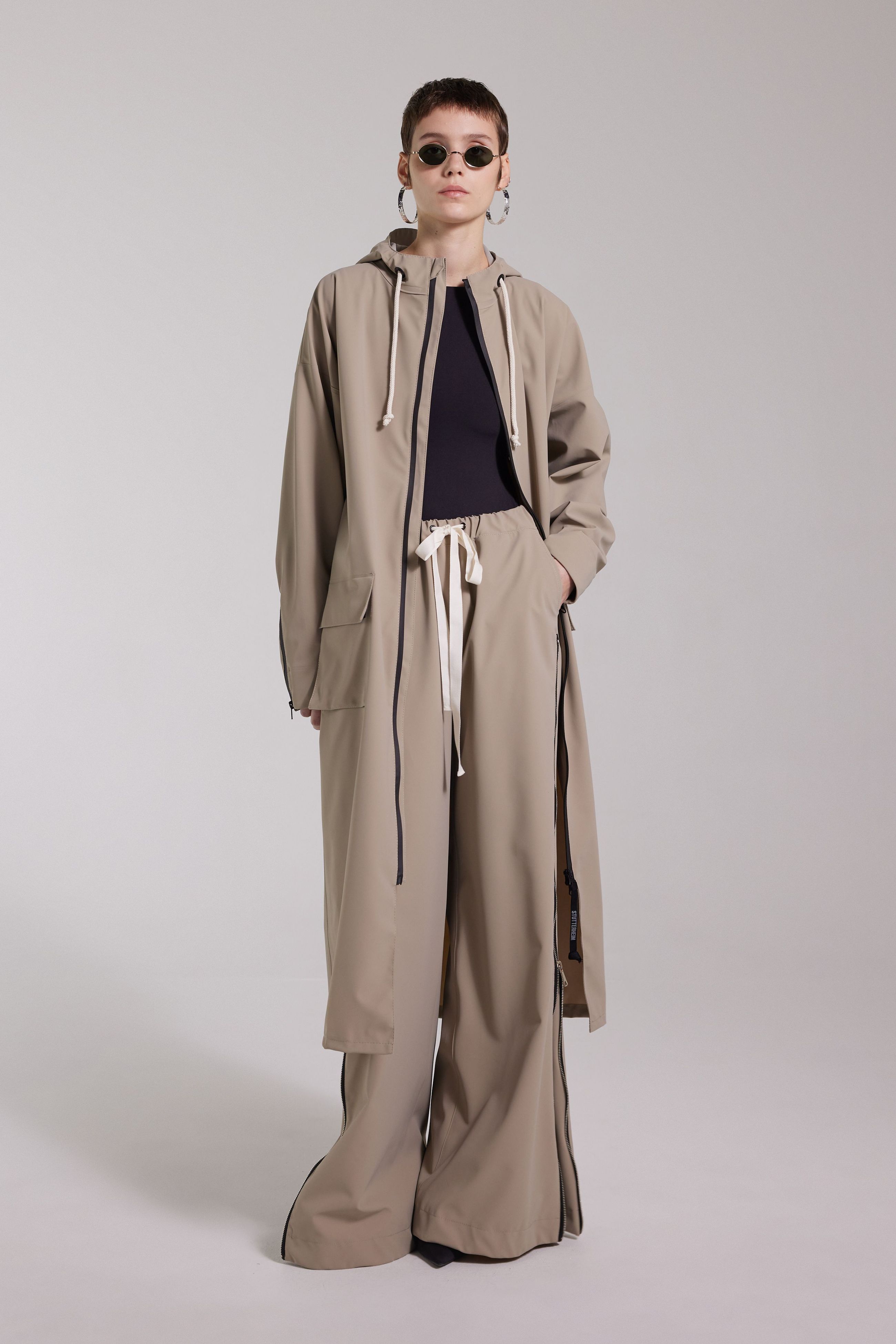 stutterheim sandviken long zip matte raincoat aloe women jackets long-raincoats
