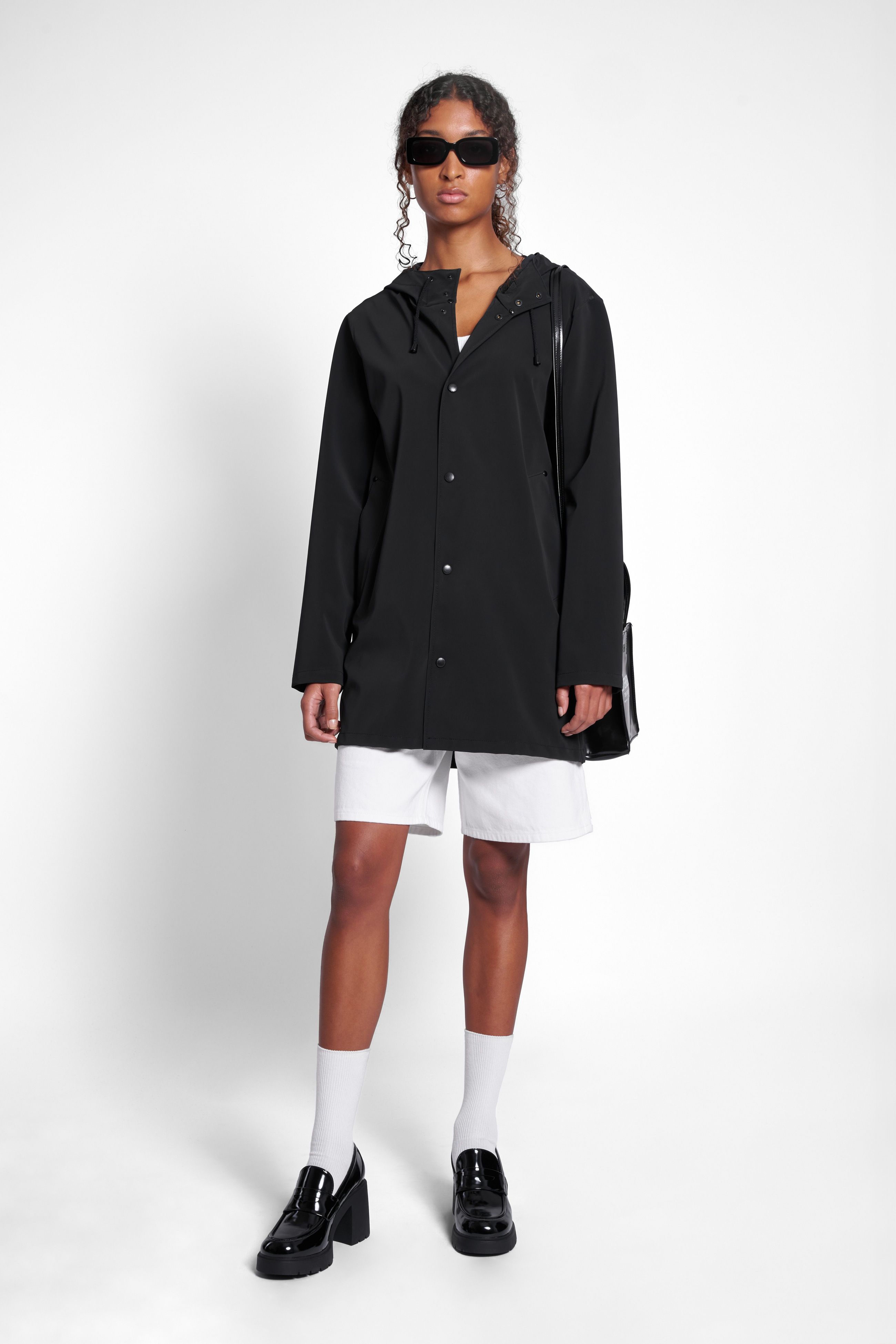 stutterheim stockholm lightweight matte raincoat black women jackets raincoats