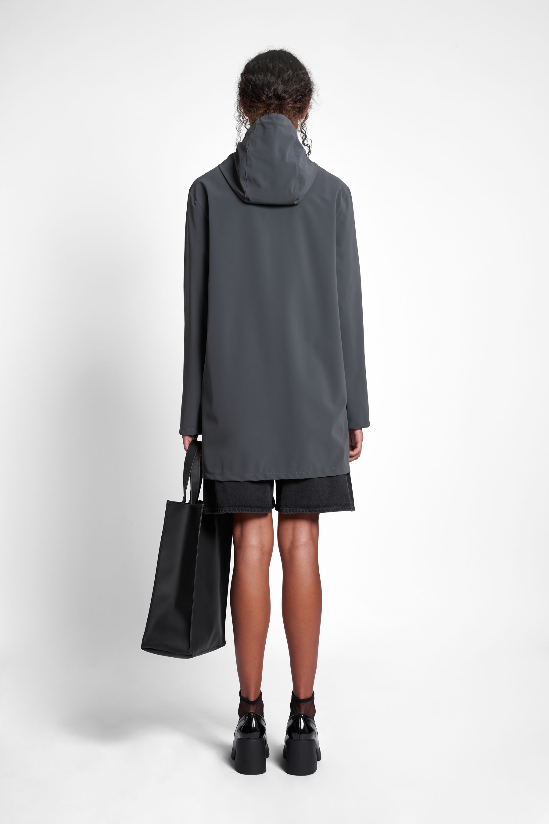 stutterheim stockholm lightweight matte raincoat charcoal women jackets raincoats