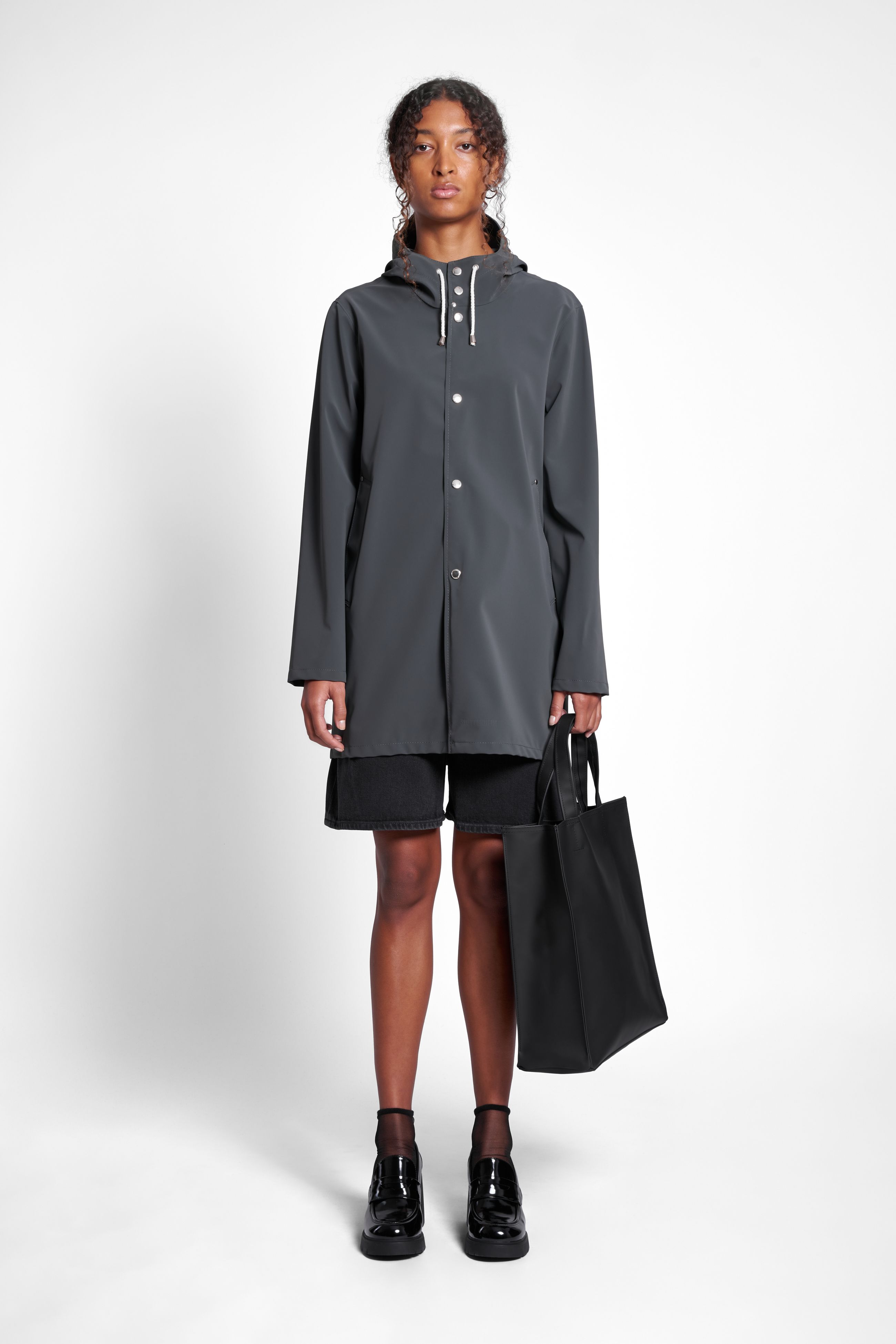 stutterheim stockholm lightweight matte raincoat charcoal women jackets raincoats