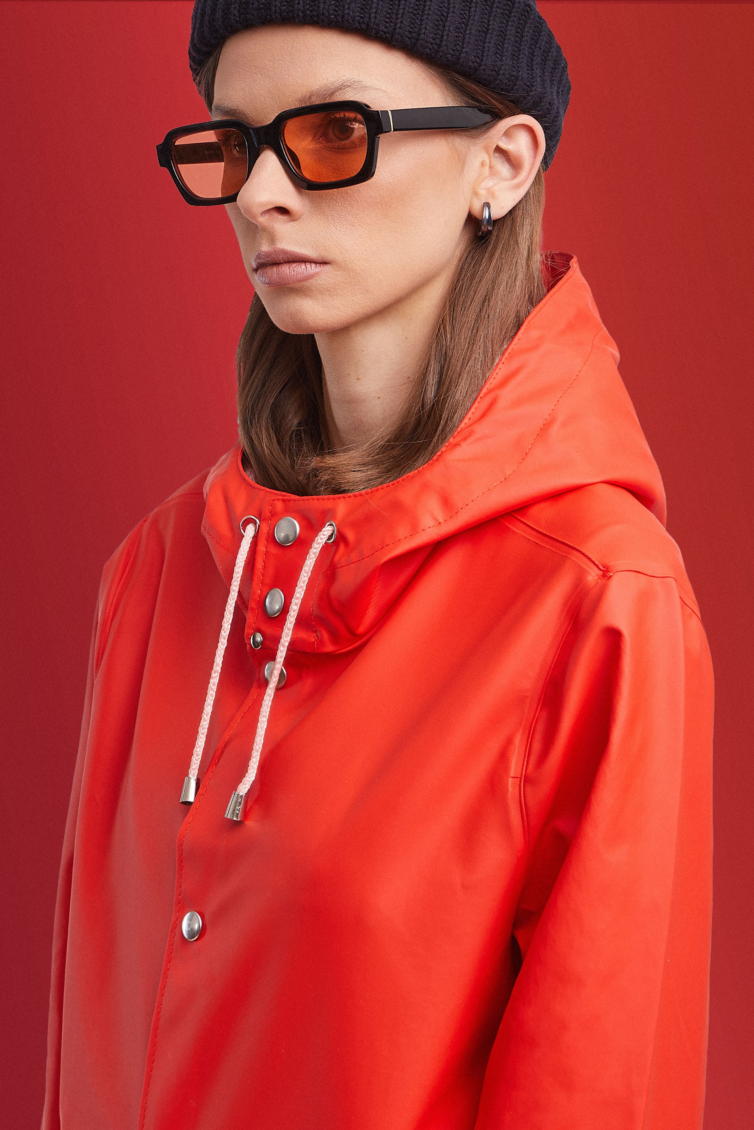 stutterheim stockholm lightweight raincoat fade red women jackets raincoats