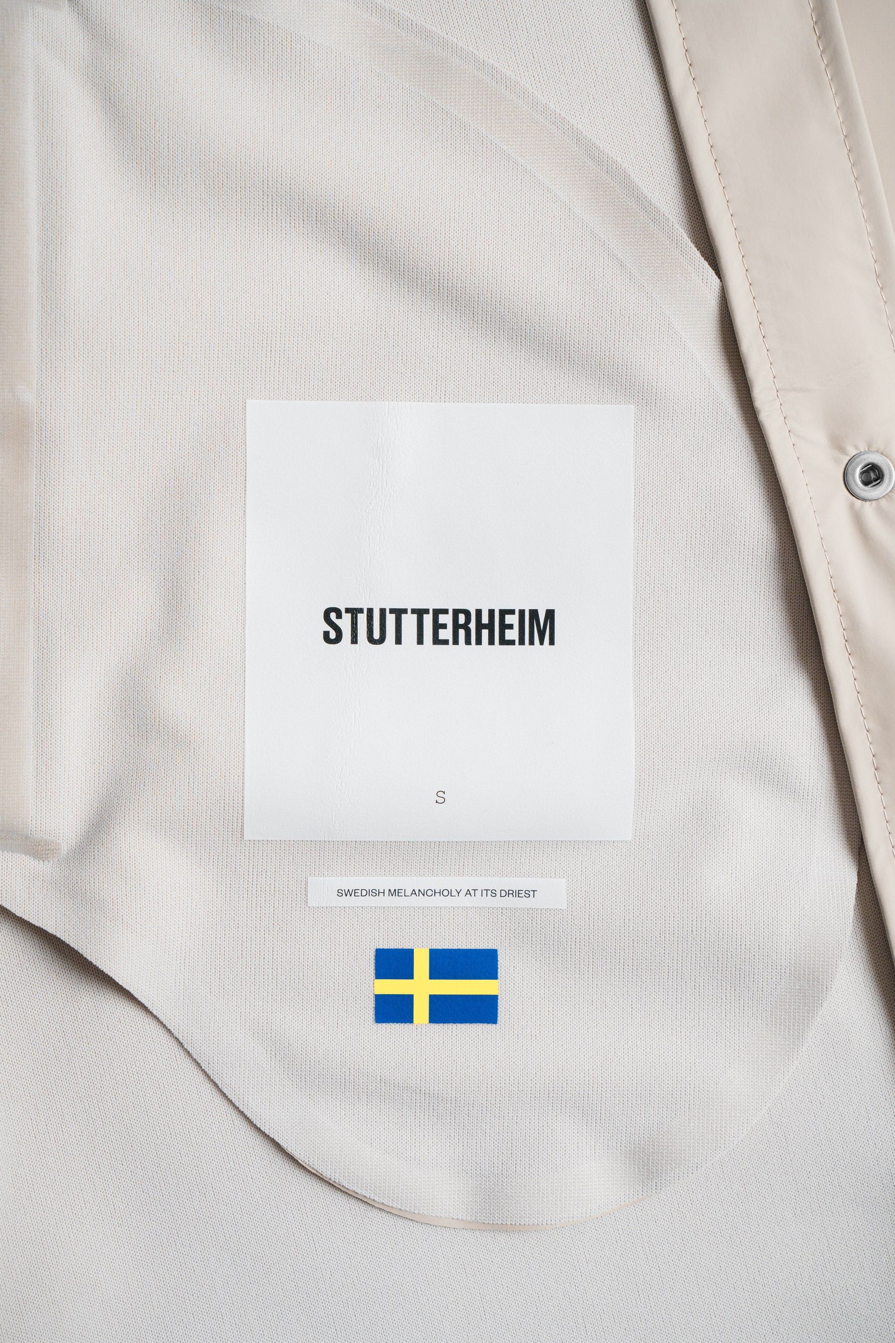 stutterheim stockholm lightweight raincoat light sand women jackets raincoats