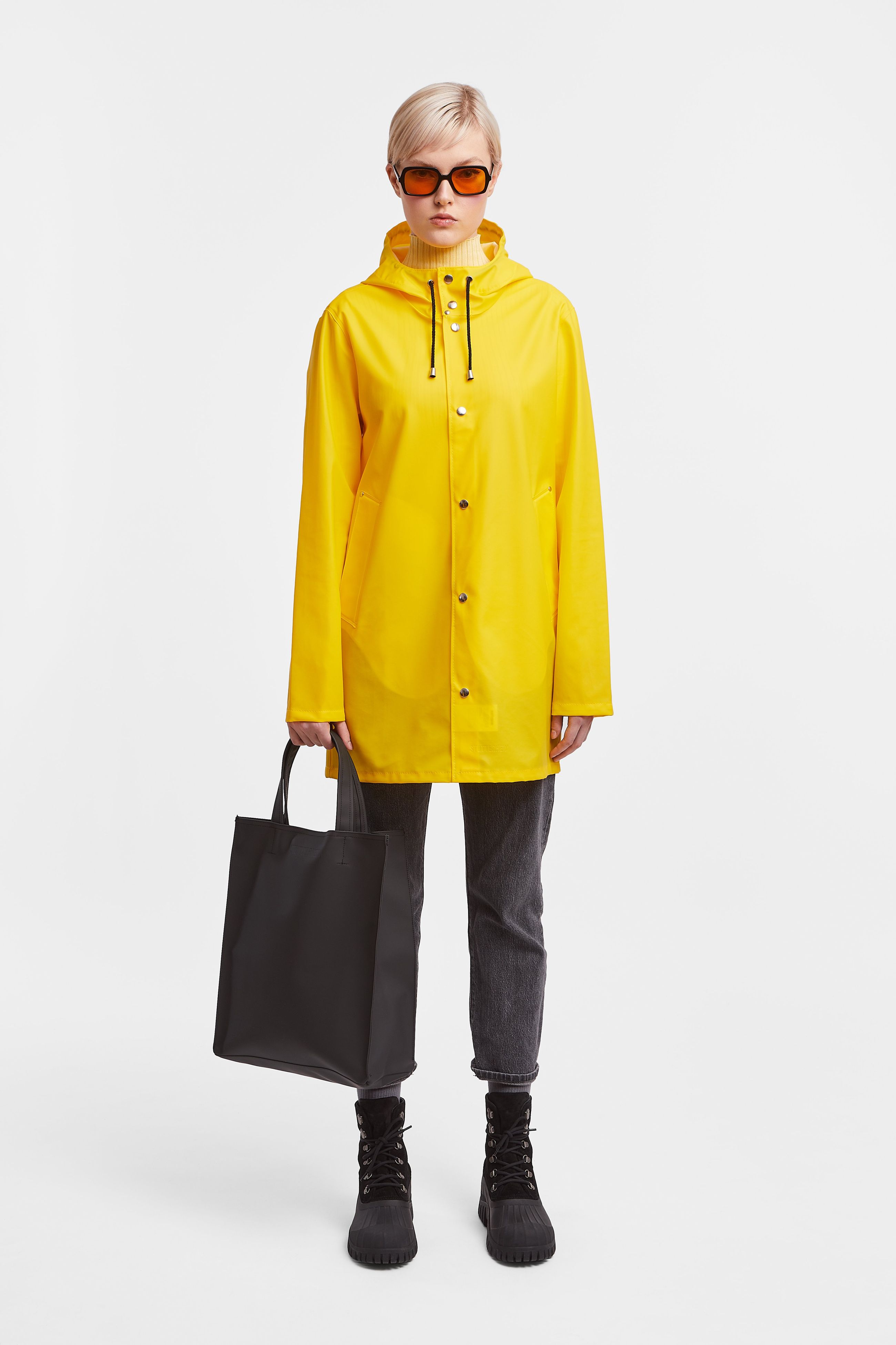 stutterheim stockholm lightweight raincoat yellow women jackets raincoats