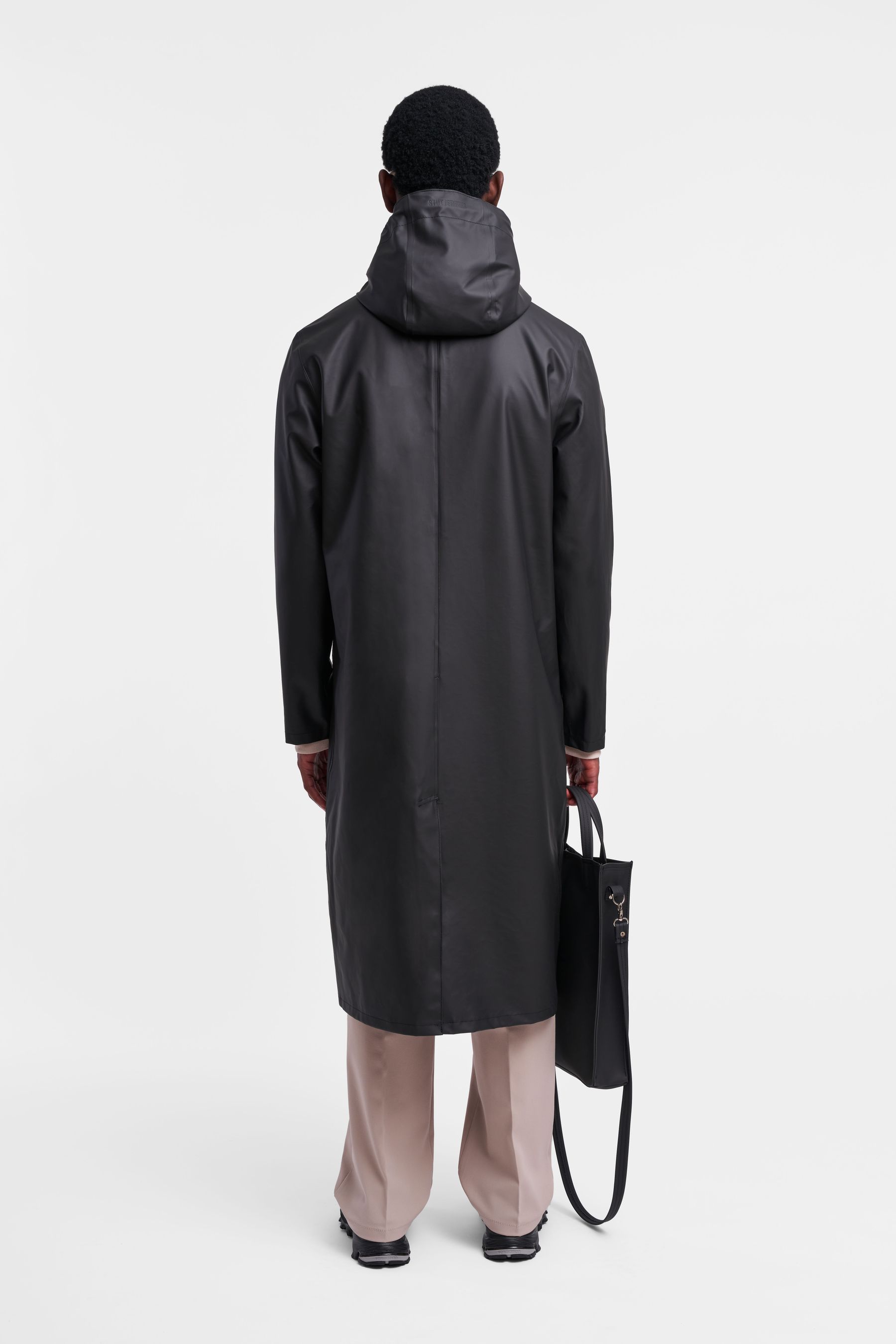 stutterheim stockholm long lightweight zip raincoat black women jackets long-raincoats