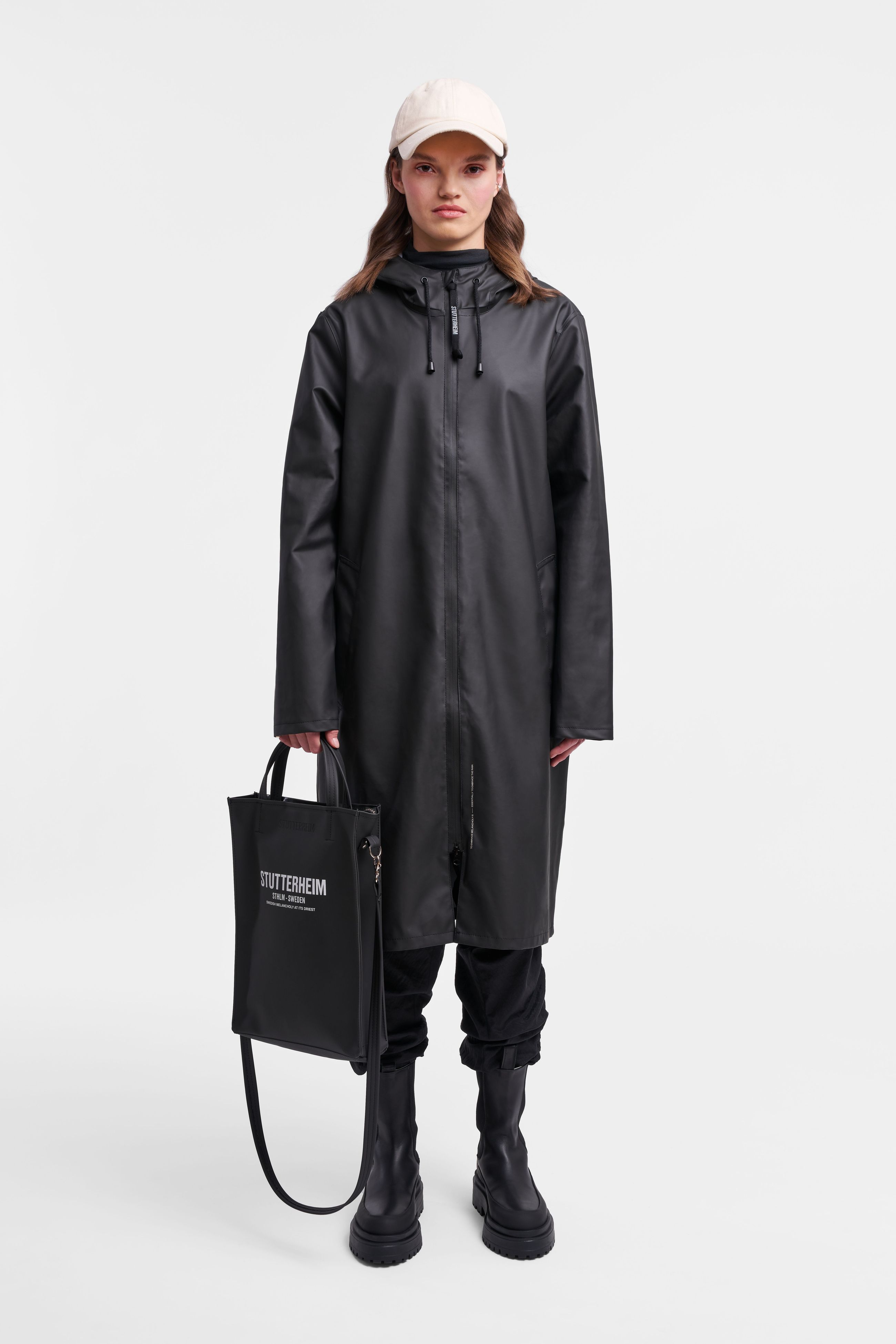 stutterheim stockholm long lightweight zip raincoat black women jackets long-raincoats
