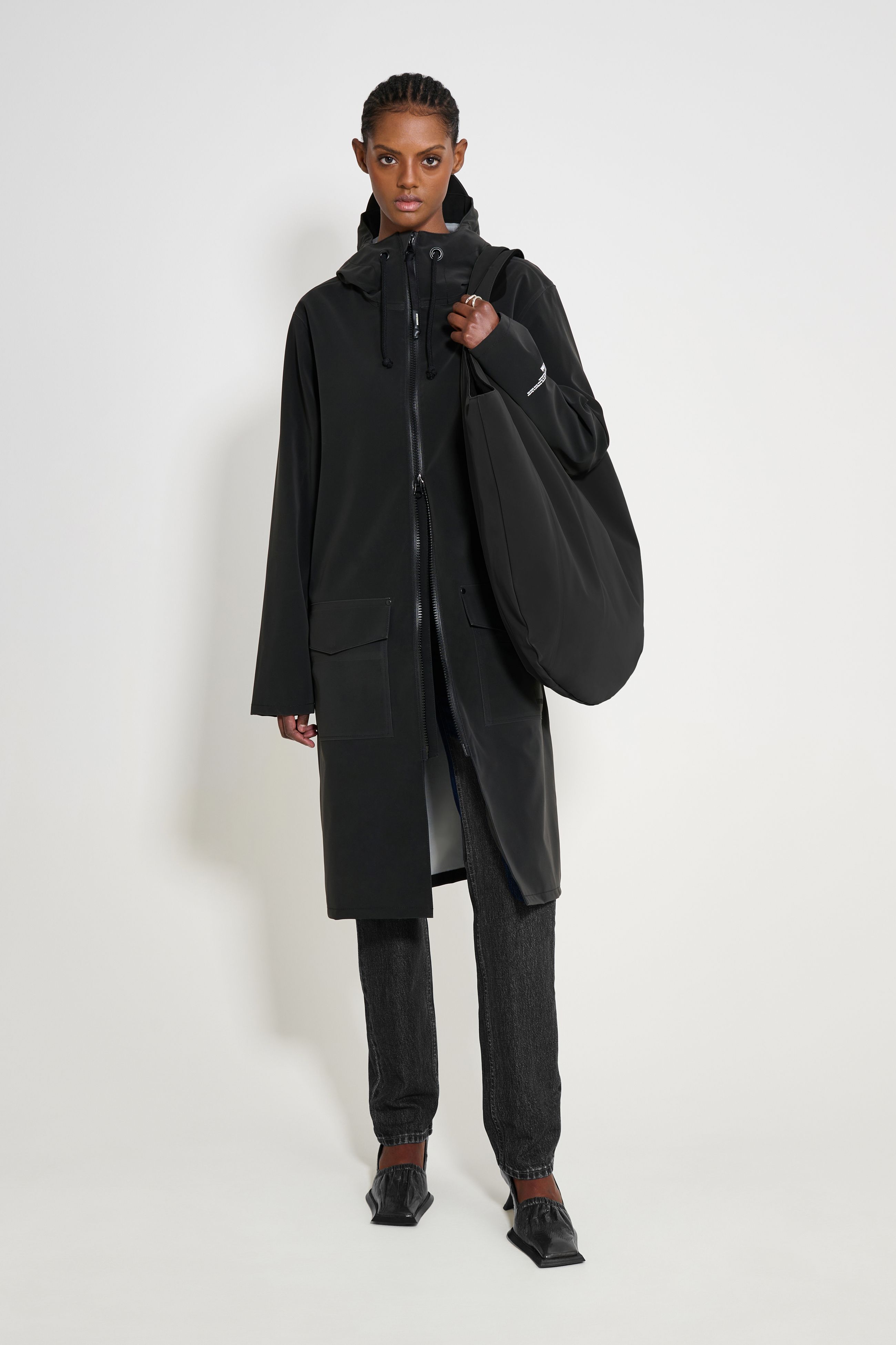 stutterheim stockholm long patch raincoat black women jackets long-raincoats