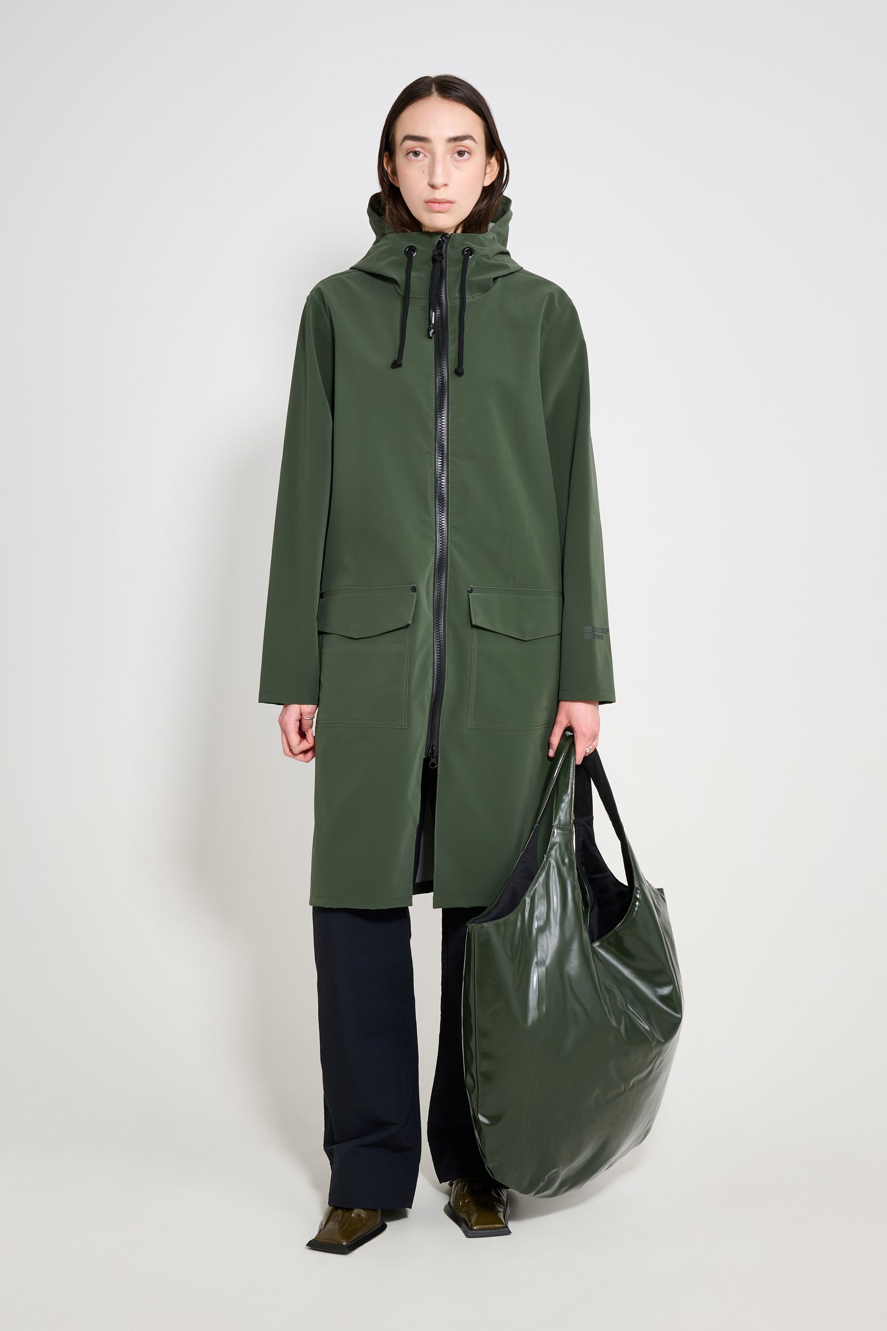 stutterheim stockholm long patch raincoat green women jackets long-raincoats