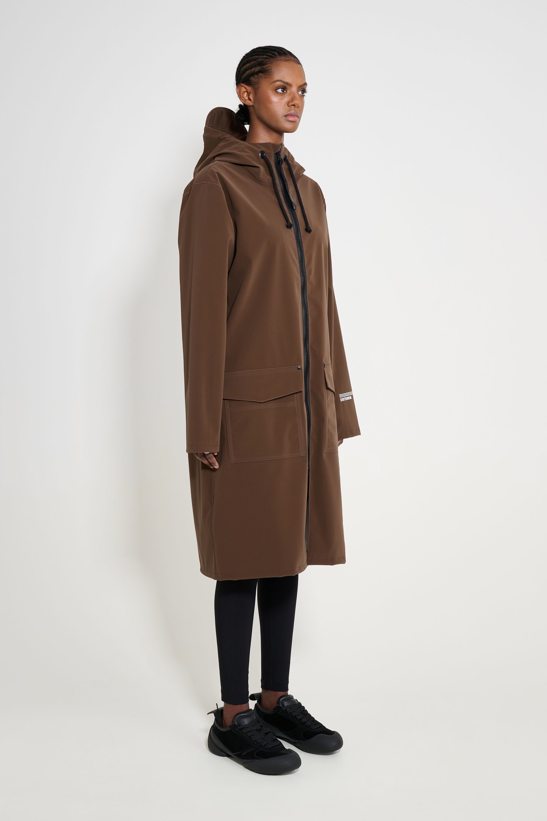 stutterheim stockholm long patch raincoat dark brown women jackets long-raincoats