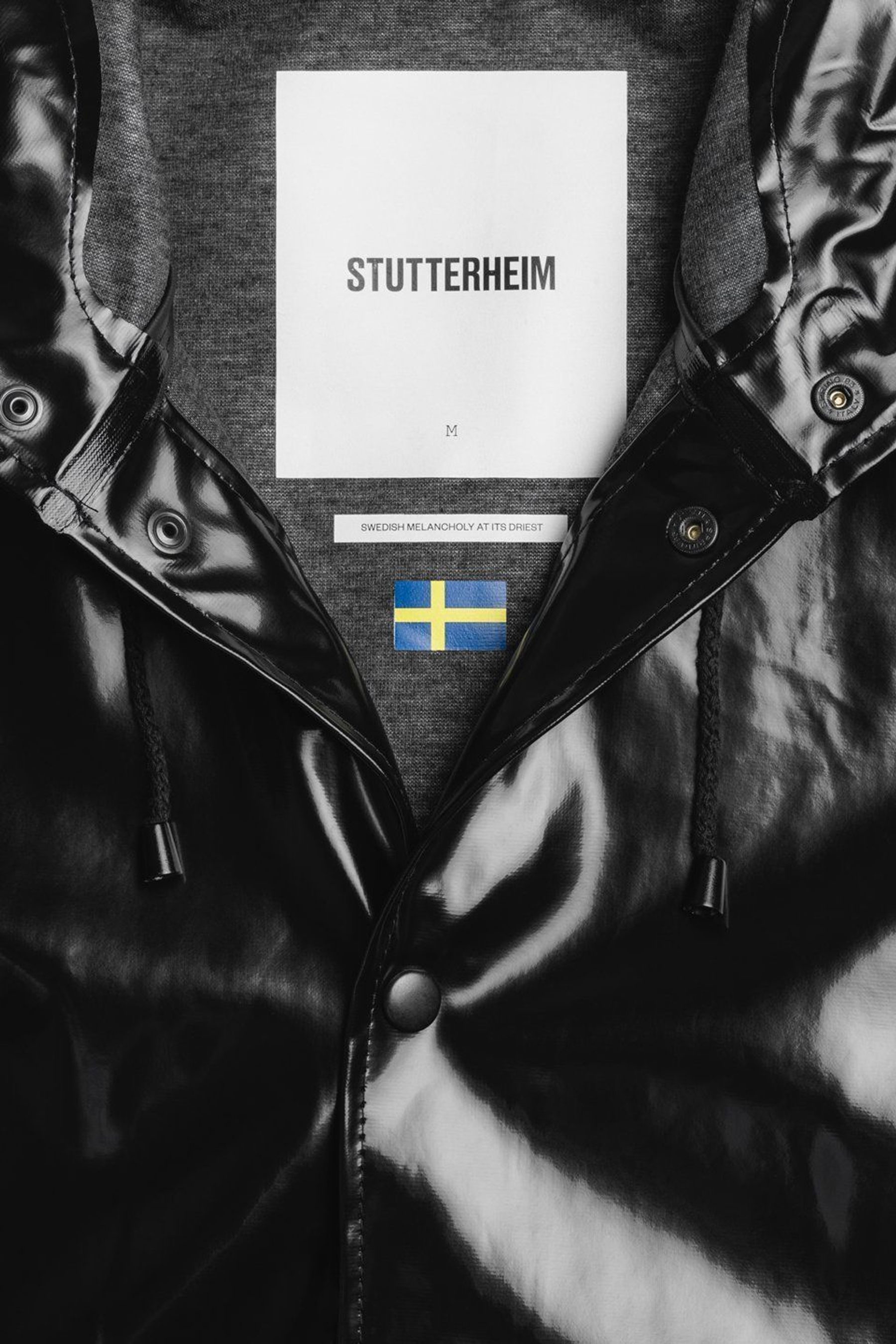 stutterheim stockholm long print opal raincoat black men jackets raincoats