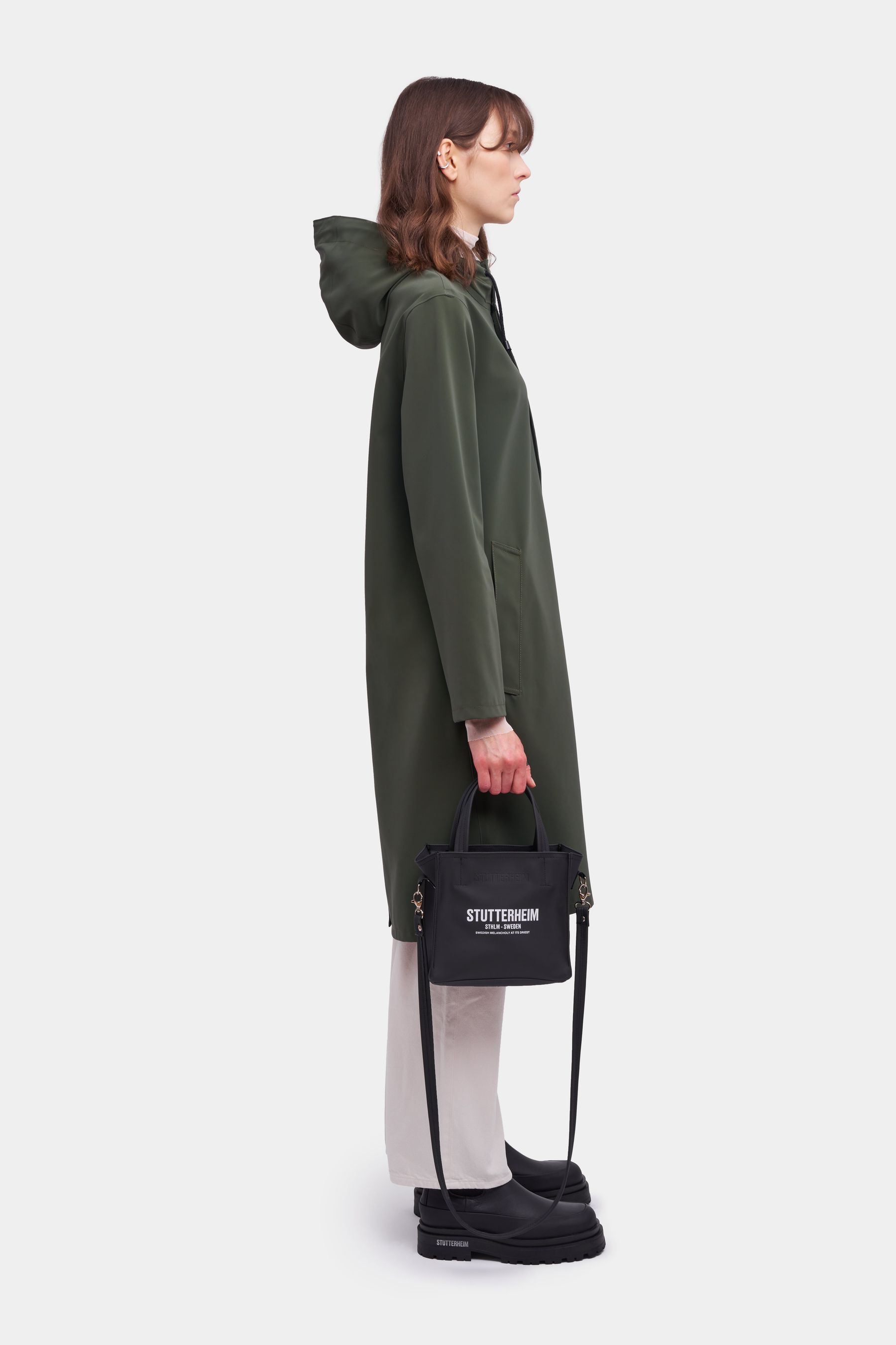 stutterheim stockholm long matte raincoat dark green women jackets raincoats