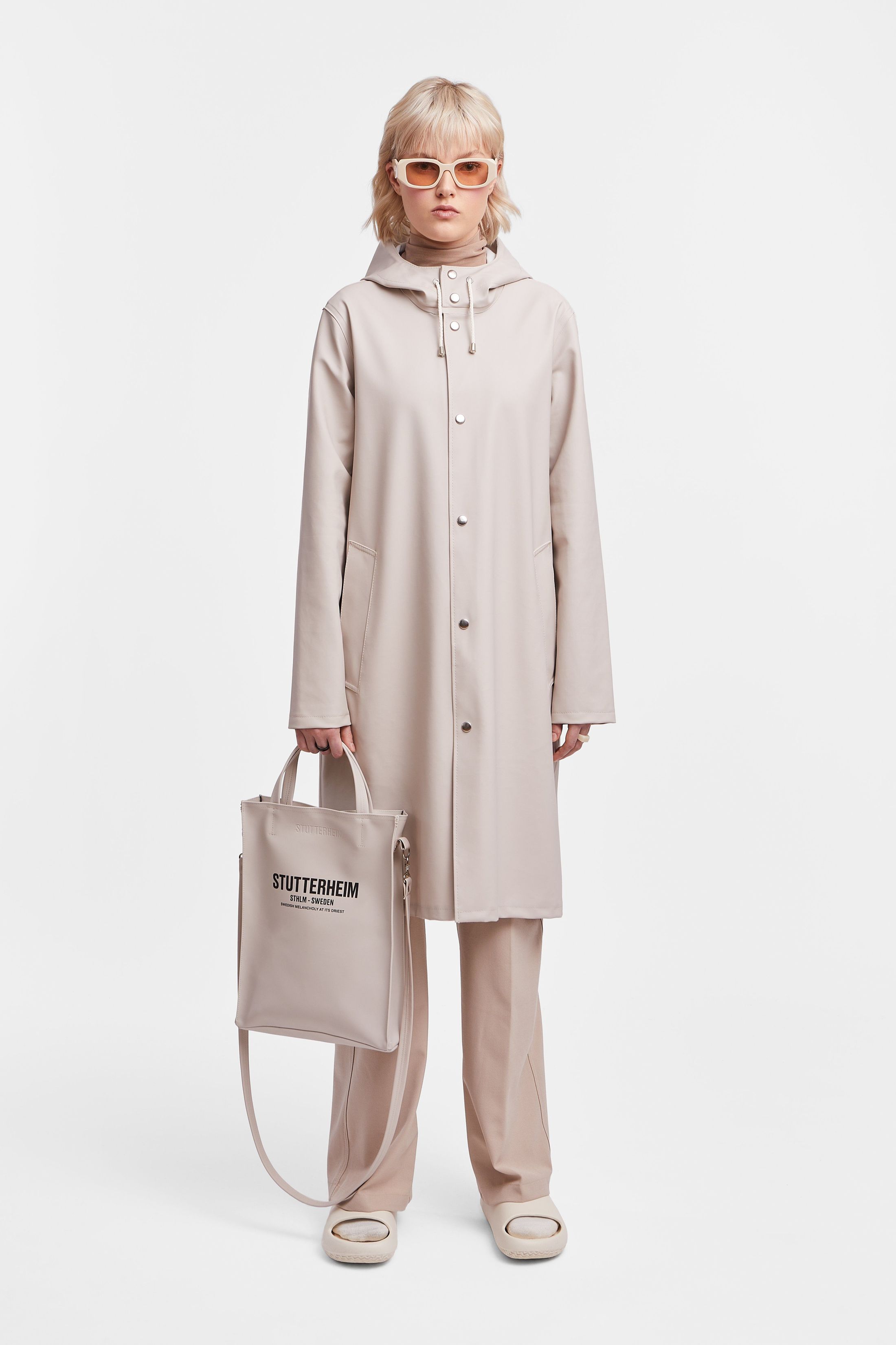 stutterheim stockholm long raincoat light sand women jackets raincoats