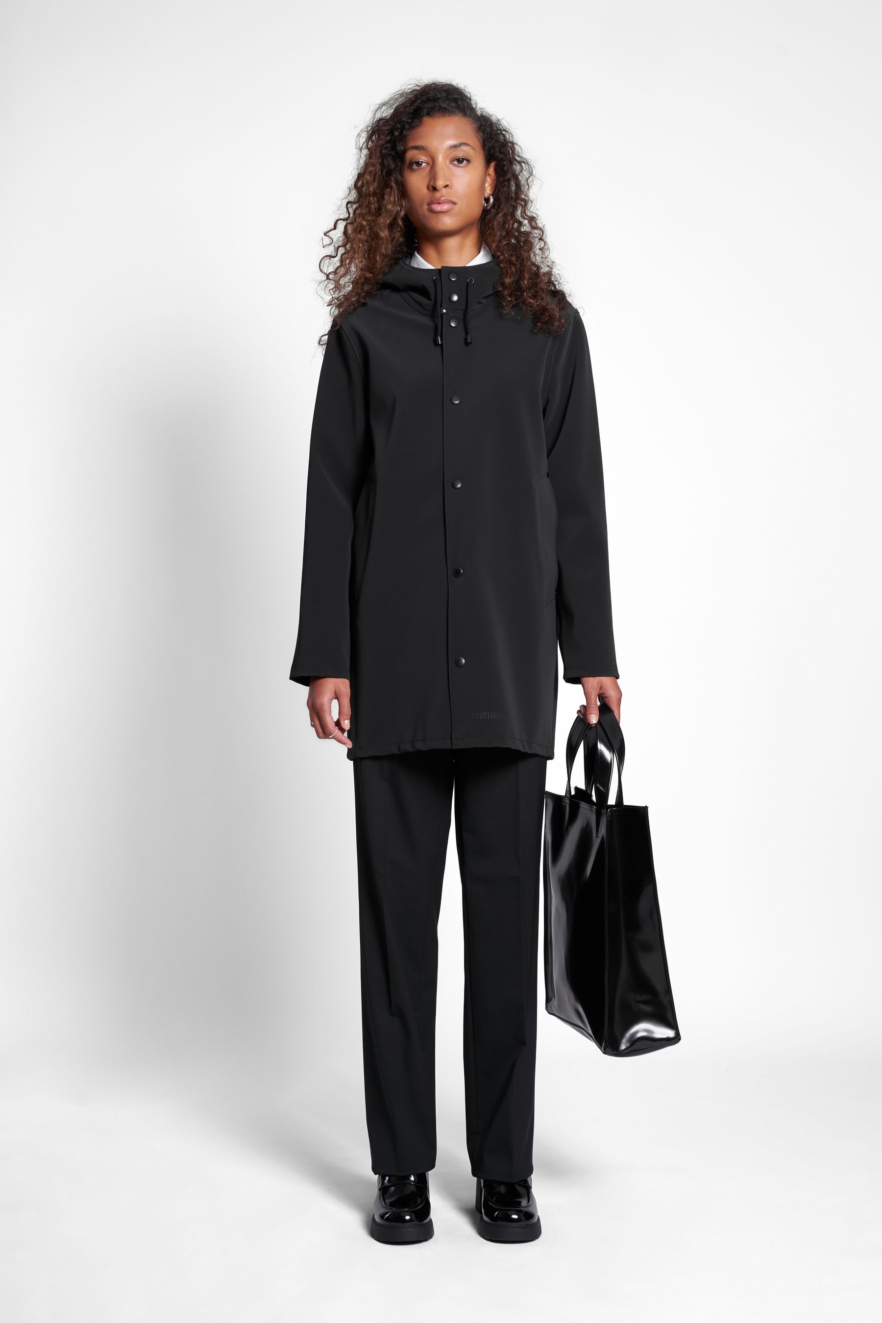 stutterheim stockholm matte raincoat black women jackets raincoats