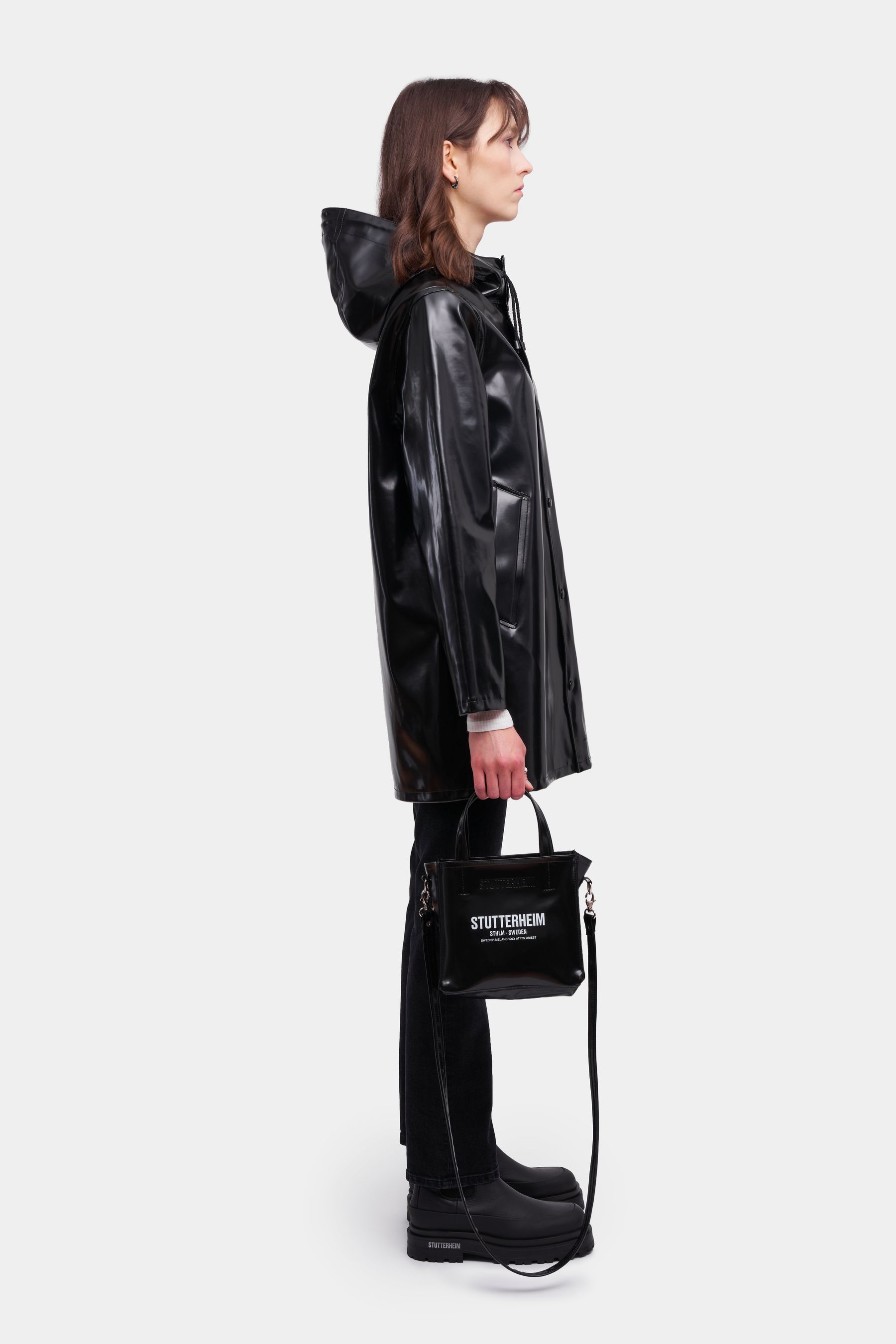 stutterheim stockholm opal raincoat black women jackets raincoats