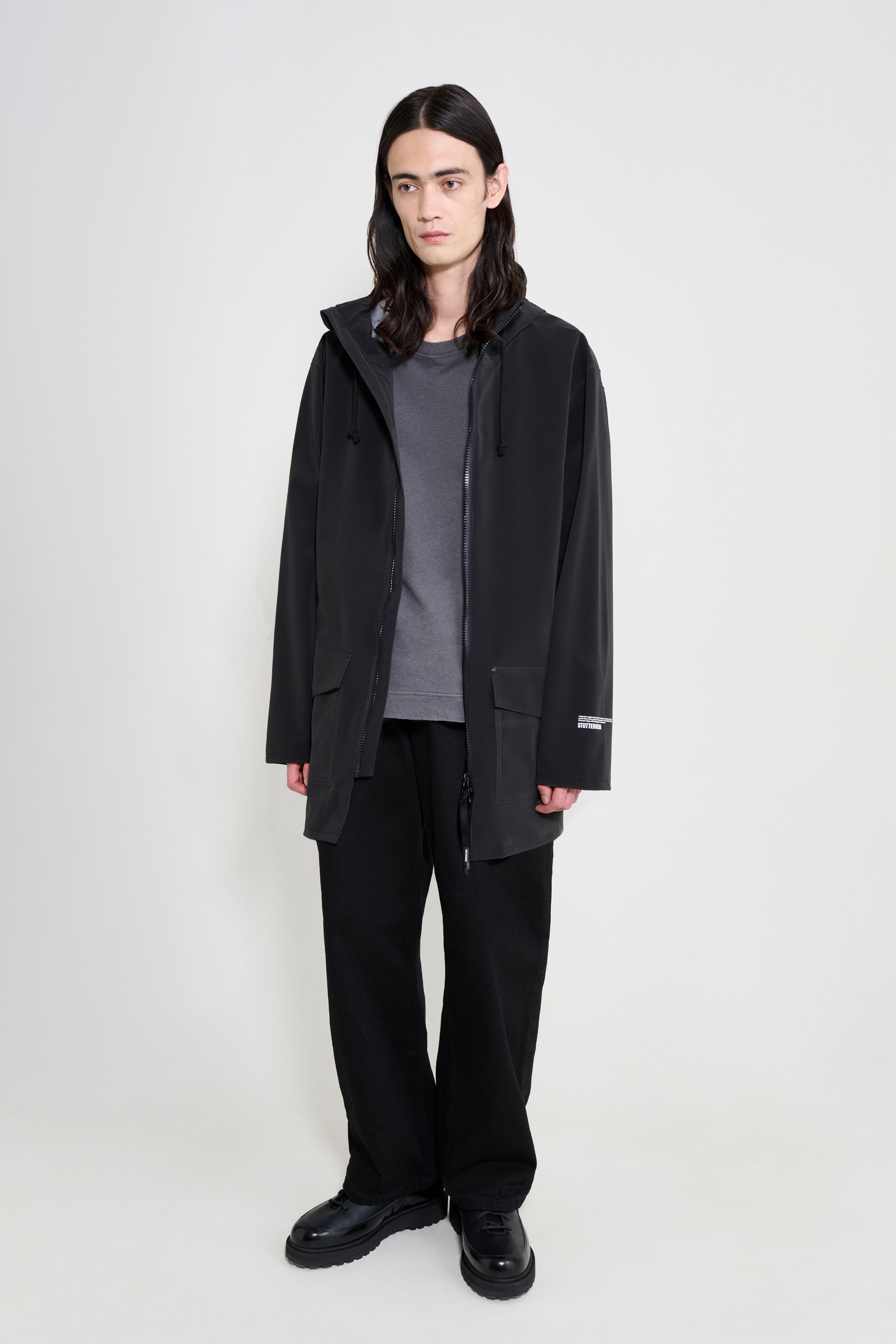 stutterheim stockholm patch raincoat black men jackets raincoats