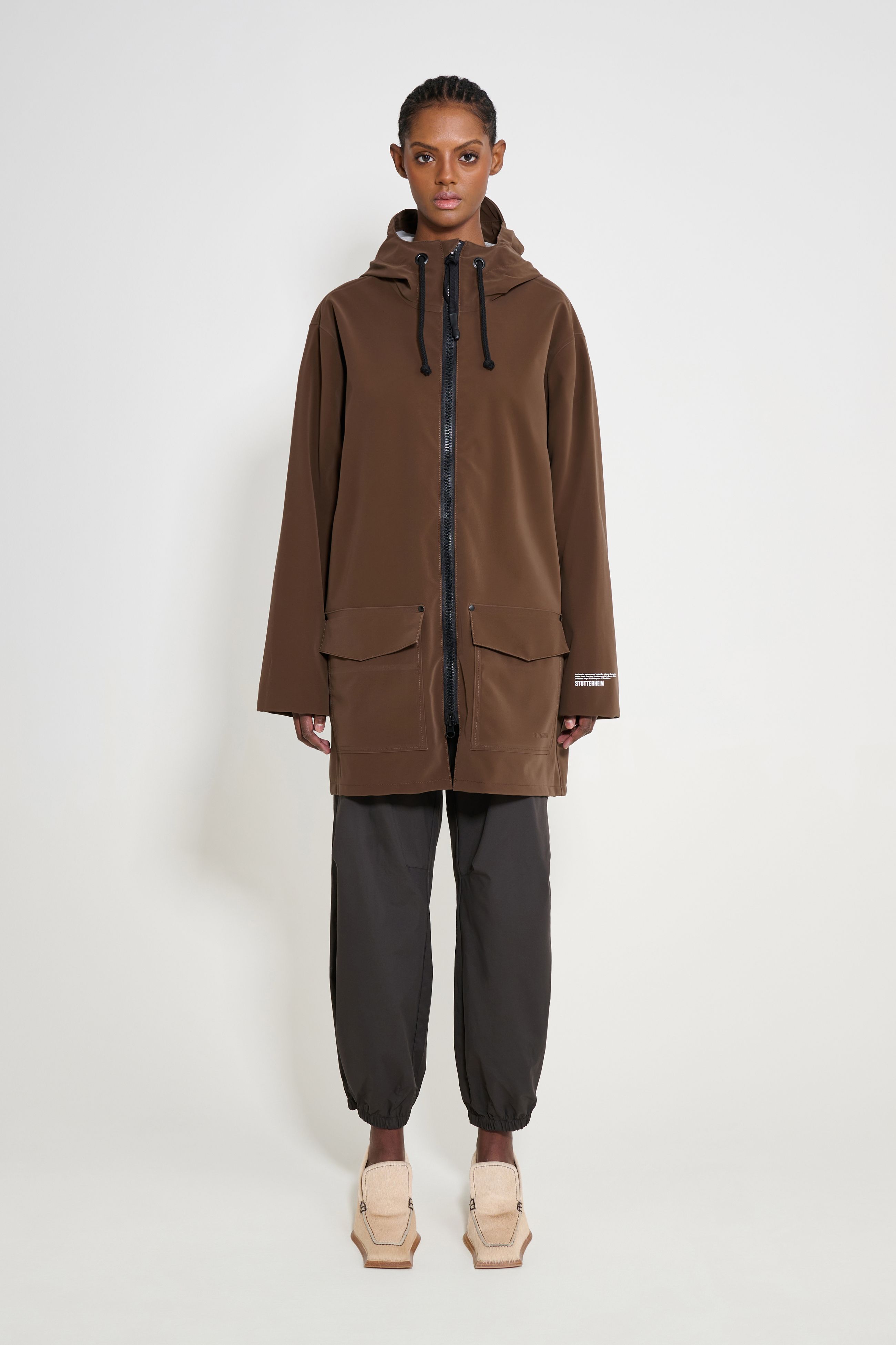 stutterheim stockholm patch raincoat dark brown women jackets raincoats