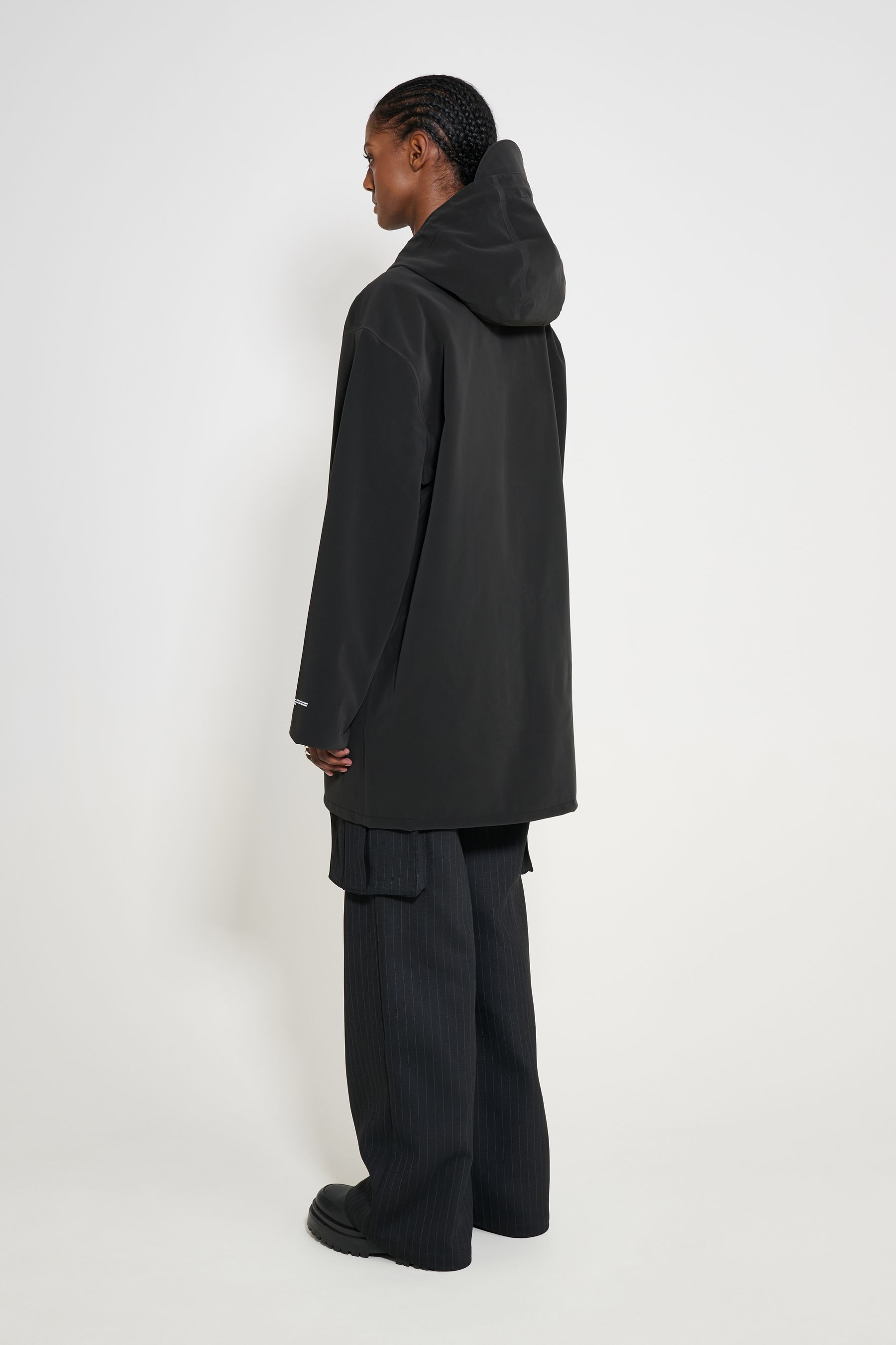 stutterheim stockholm patch raincoat black women jackets
