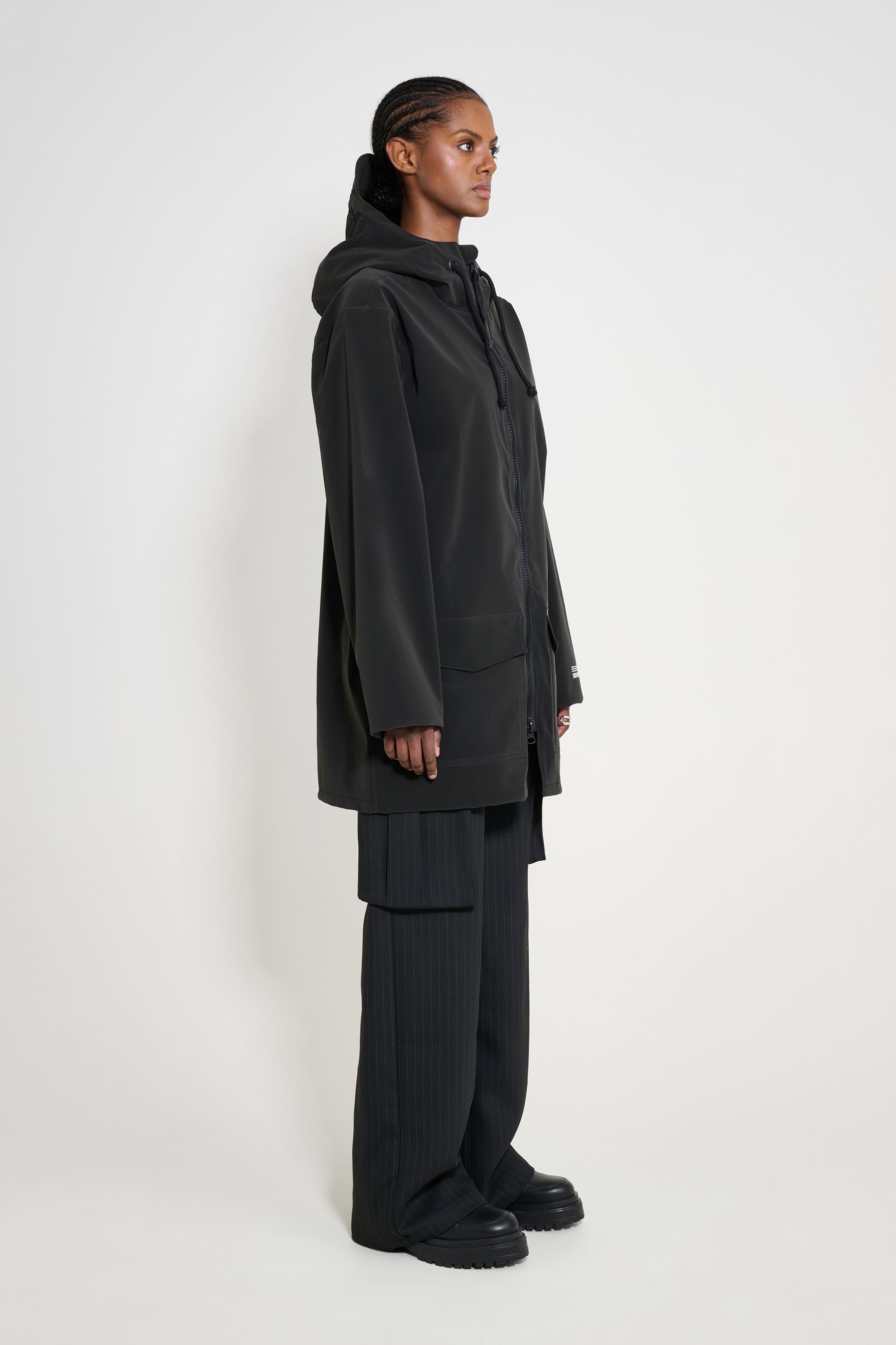 stutterheim stockholm patch raincoat black women jackets
